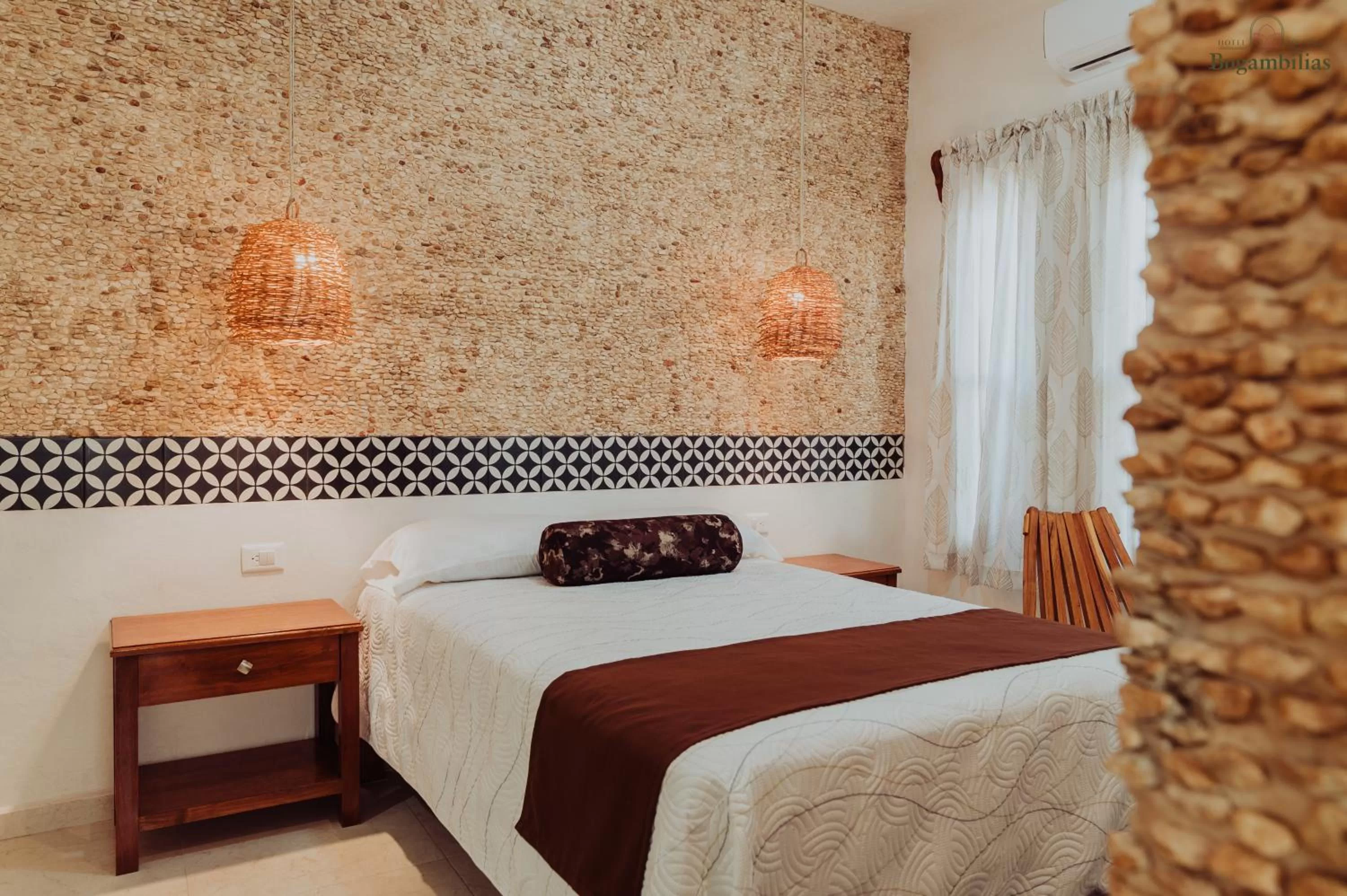 Bed in Hotel Boutique Bugambilias