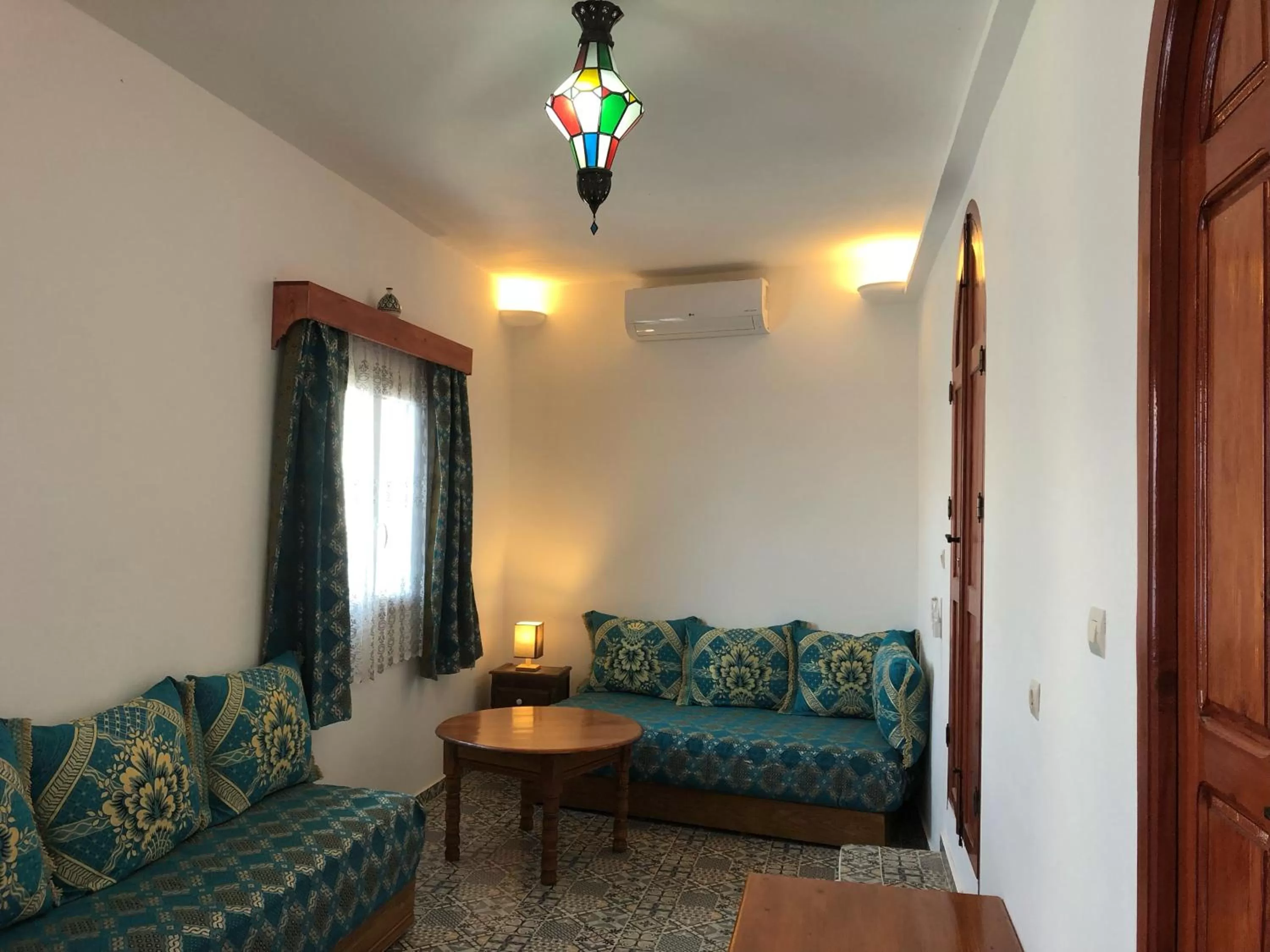 Bed, Seating Area in Dar Fatima