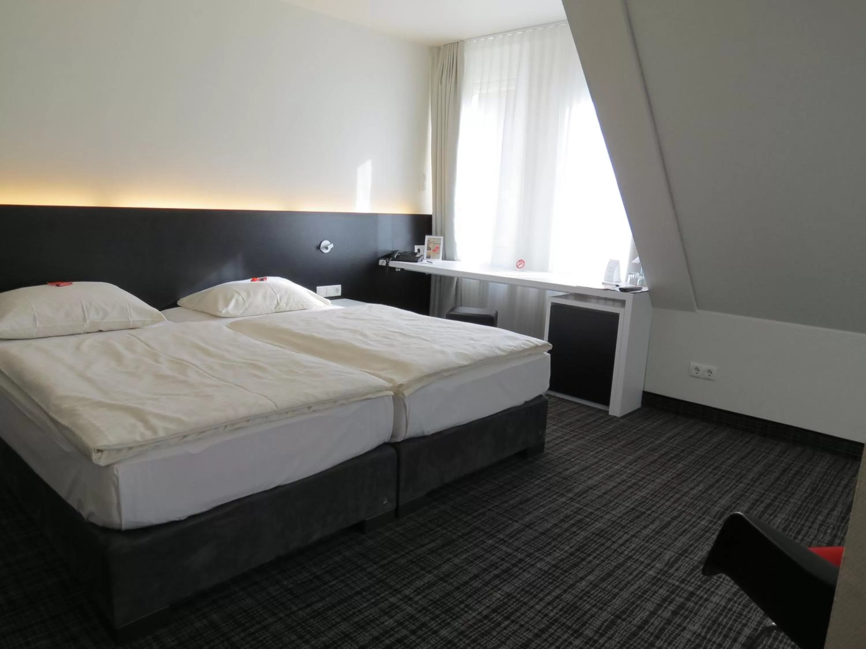 Bed in Comfor Hotel Ulm City