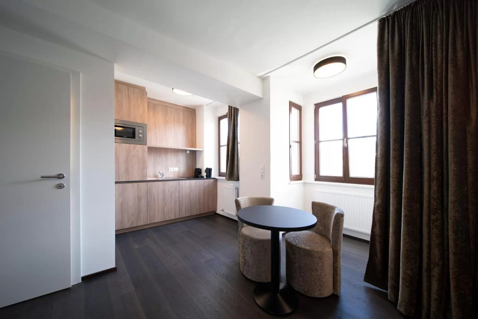 Kitchen or kitchenette in Blackhome Innsbruck Boutique I contactless check-in