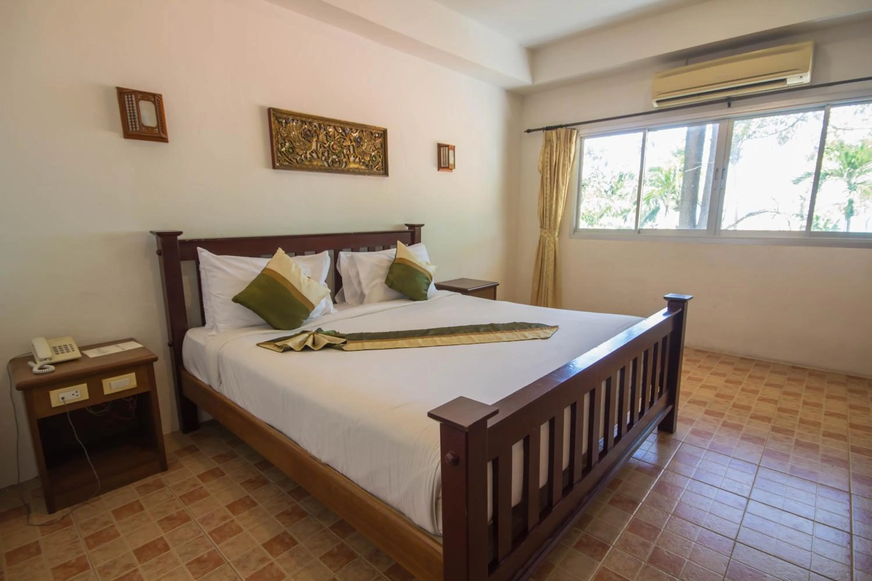 Bed in Rajapruek Samui Resort - SHA Plus