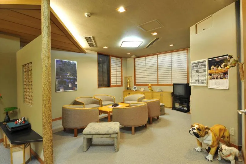 Communal lounge/ TV room in Nakayasu Ryokan