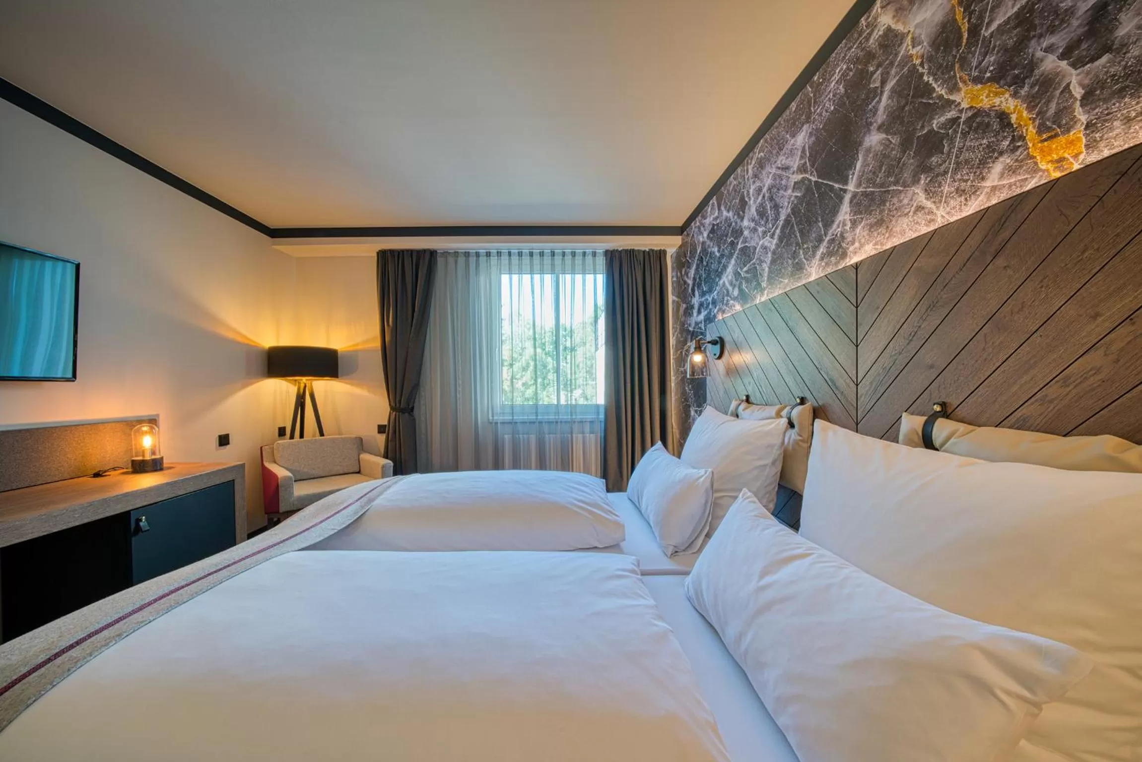 Photo of the whole room, Bed in FourSide Hotel Salzburg Messe, Trademark Collection by Wyndham