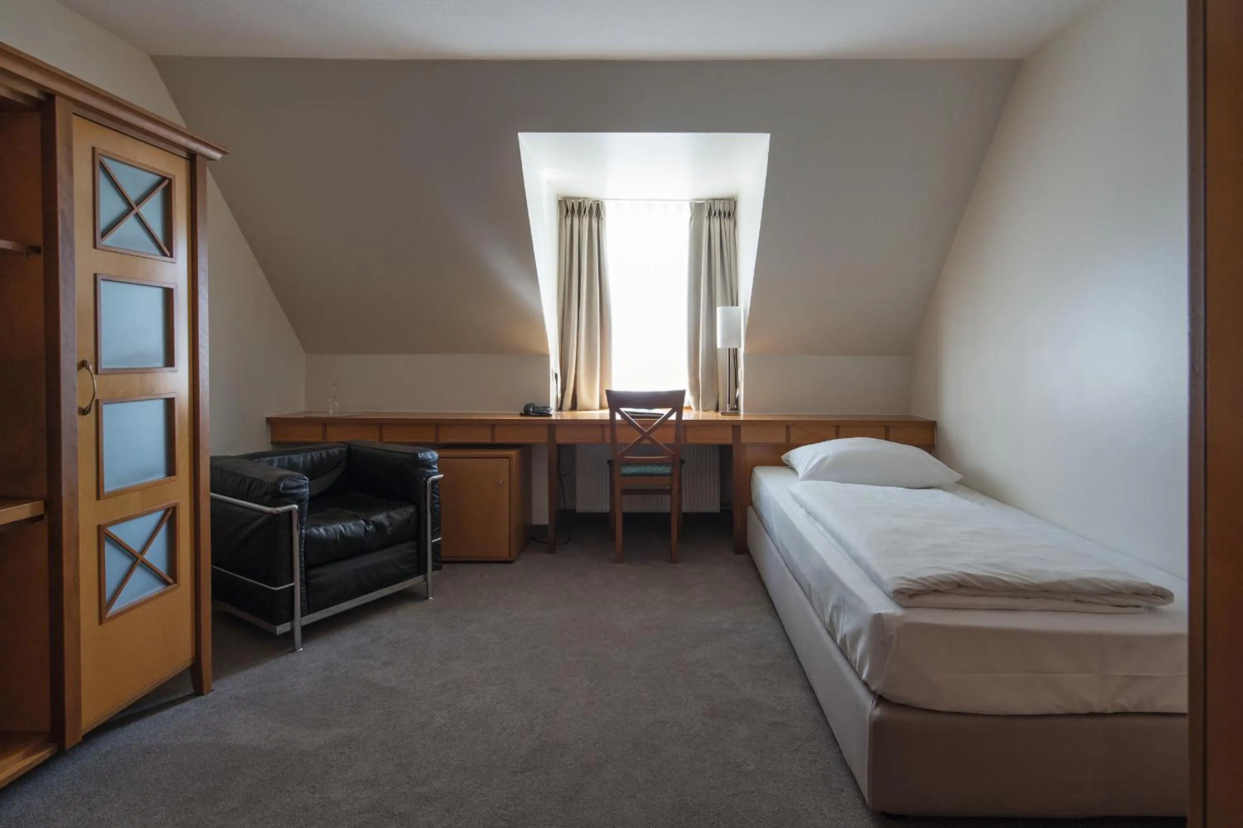 Photo of the whole room, Bed in Parkhotel Schmid