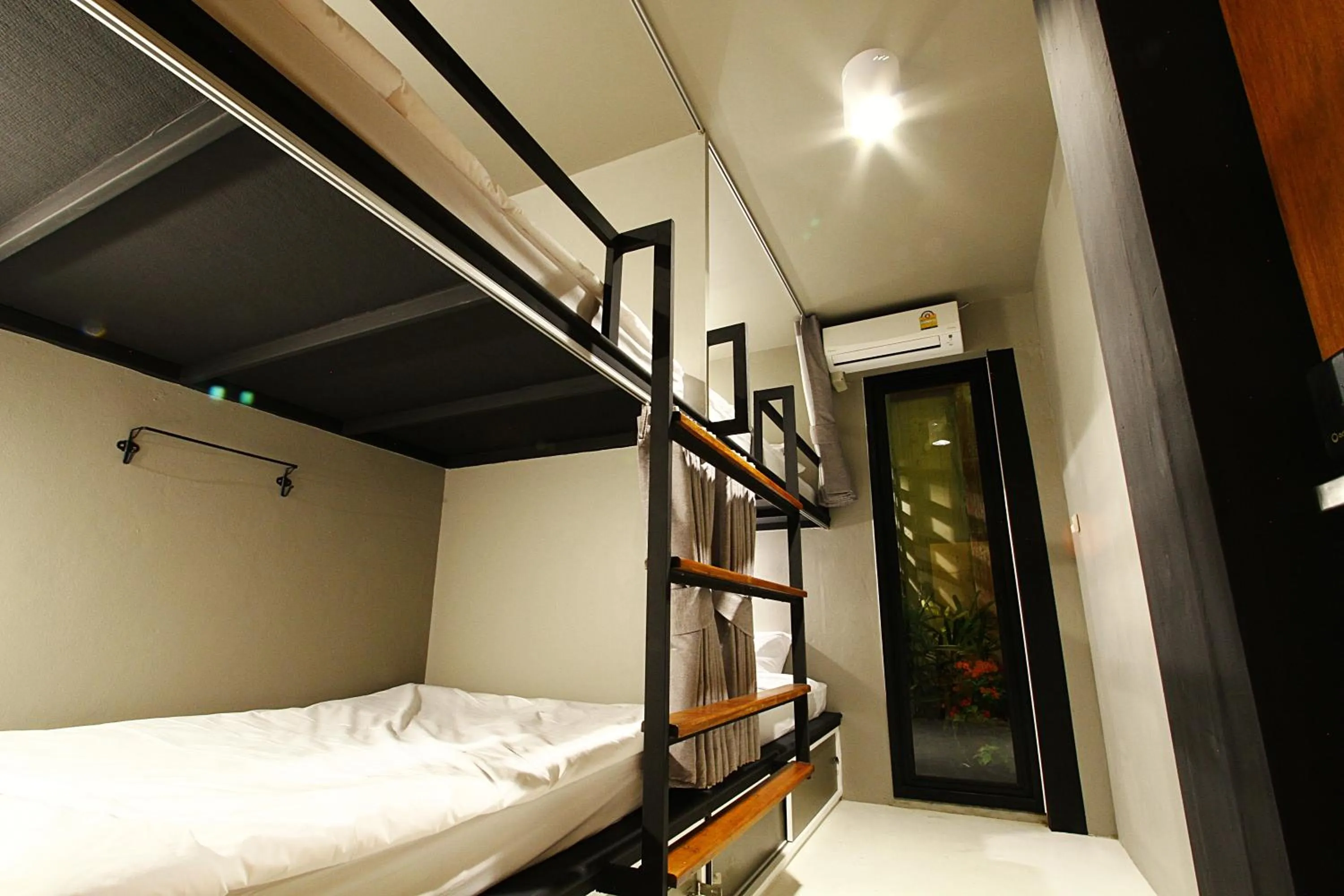 Photo of the whole room, Bed in Here Hostel Bangkok