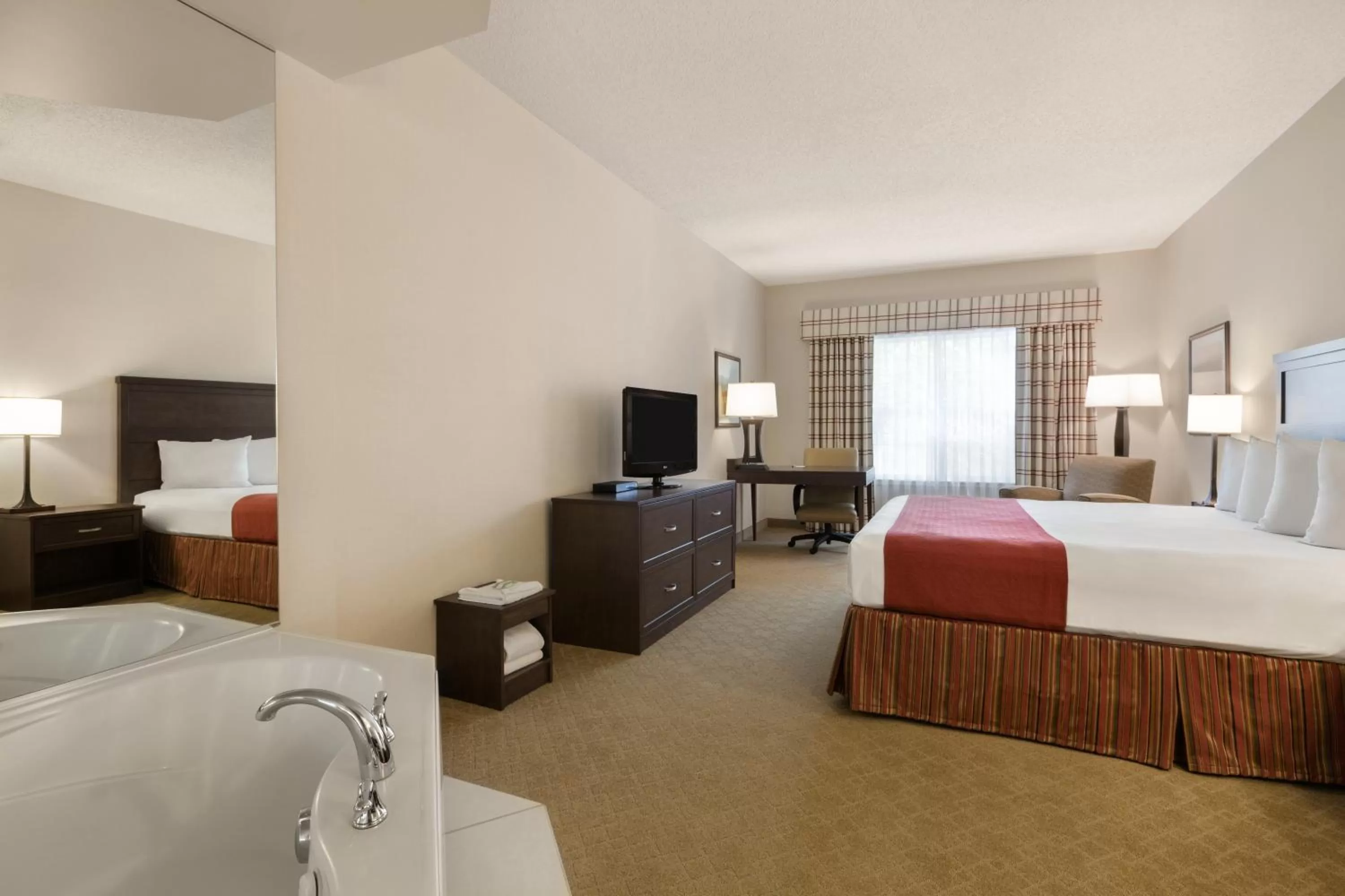 Photo of the whole room, Bed in Country Inn & Suites by Radisson, Calgary-Northeast