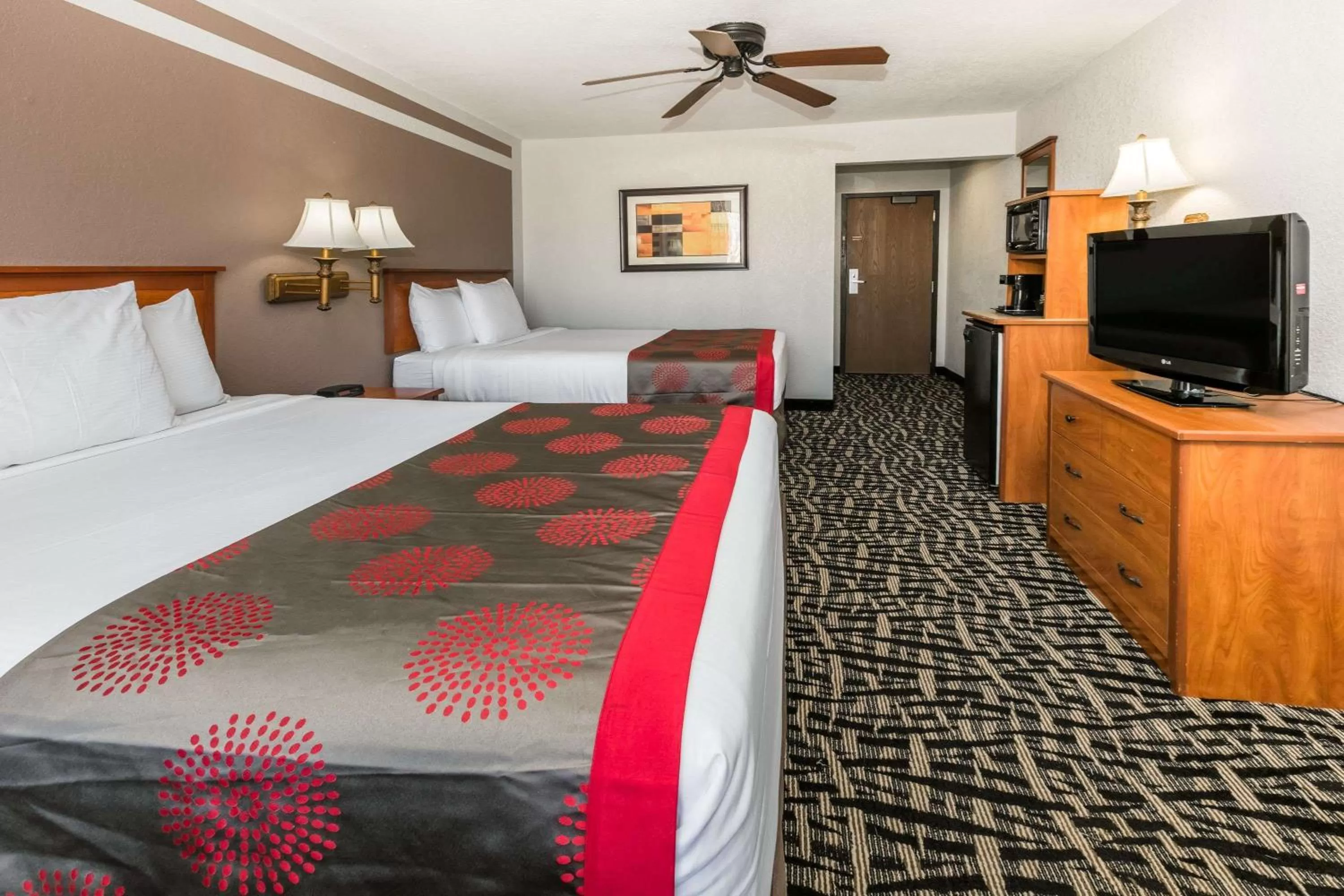 Queen Room with Two Queen Beds  Smoking in Ramada by Wyndham Oklahoma City Airport North