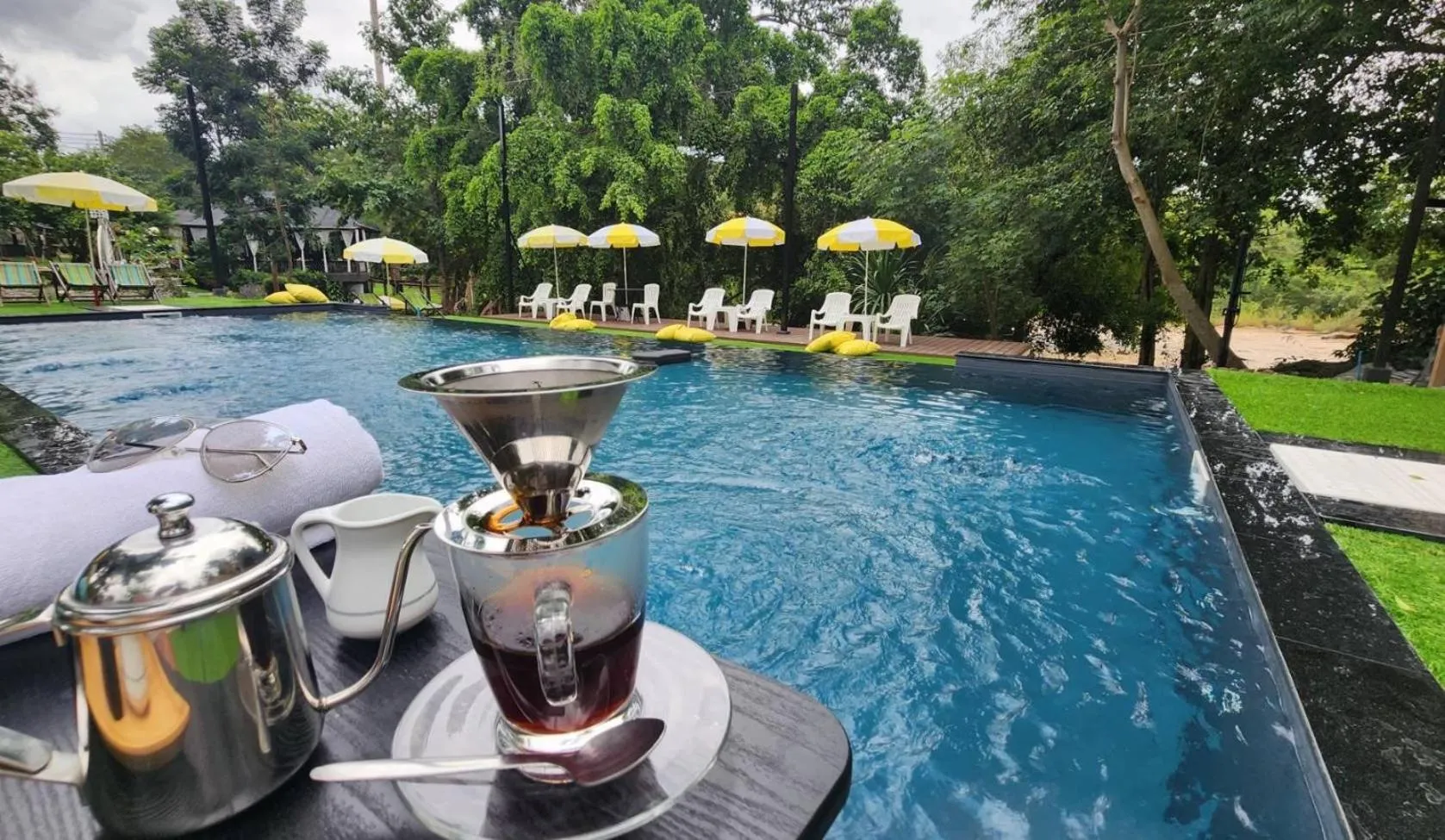 Swimming pool in Naturalpark Resort De Wangthong