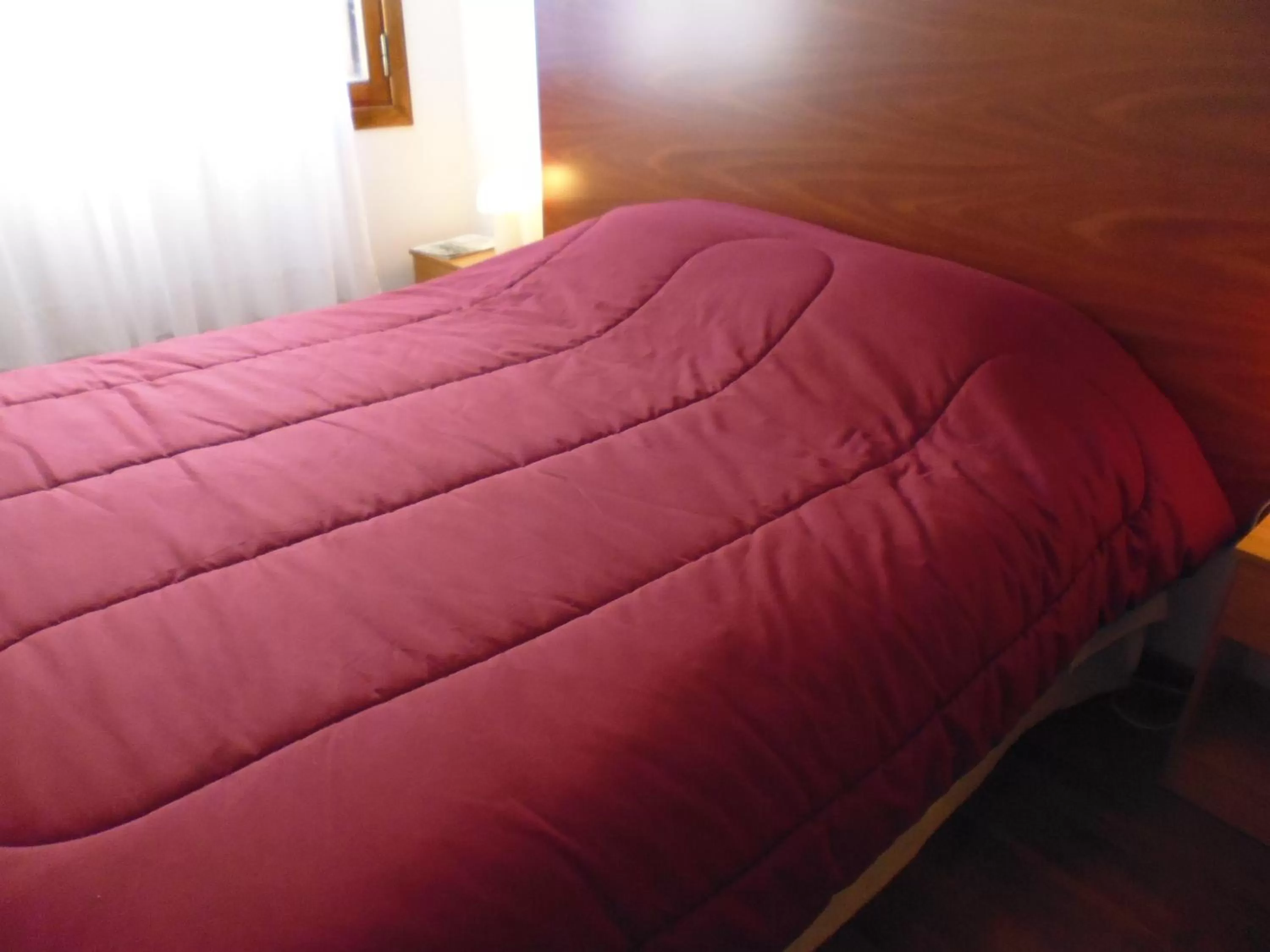 Bed in Tango B&B