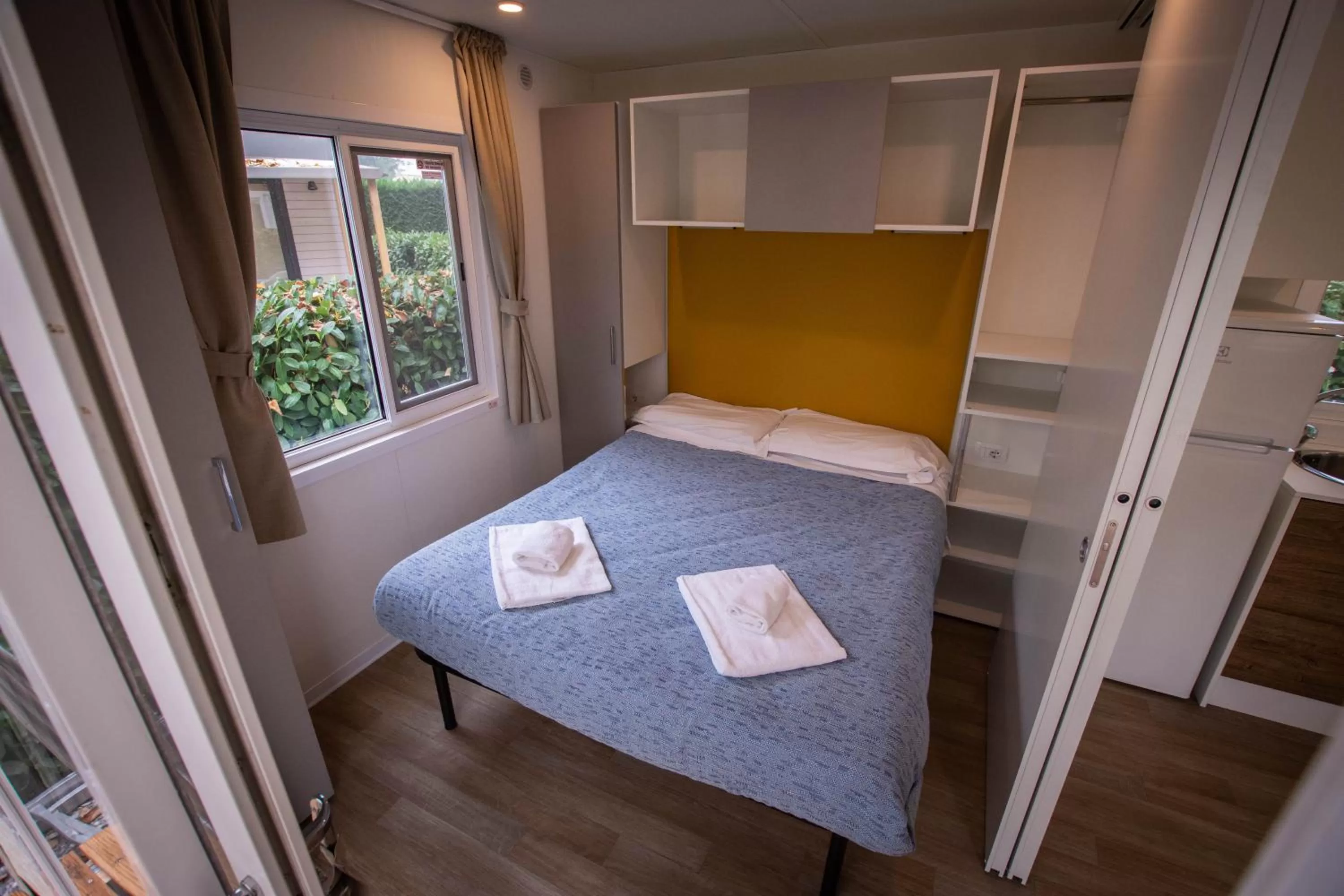 Bed in Albavillage Rooms & Camping