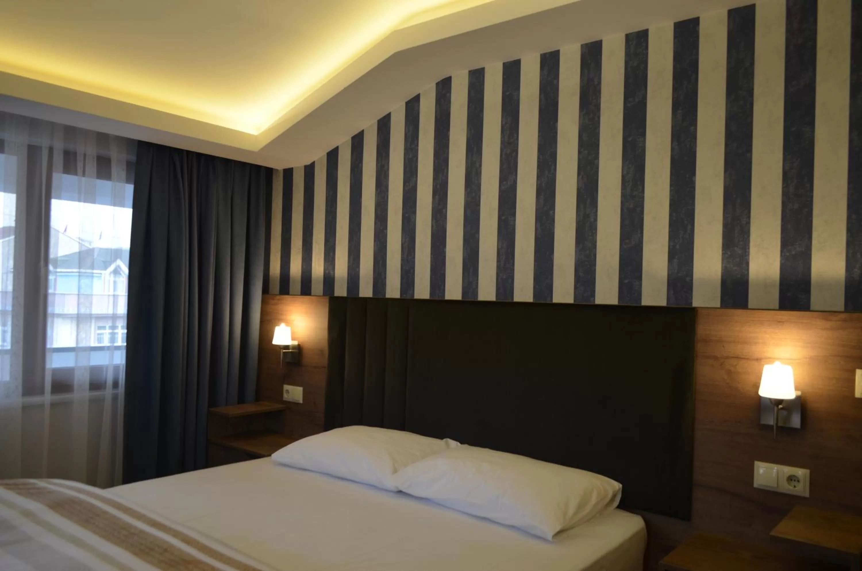 Bed in Yılmaz Suit Apartments
