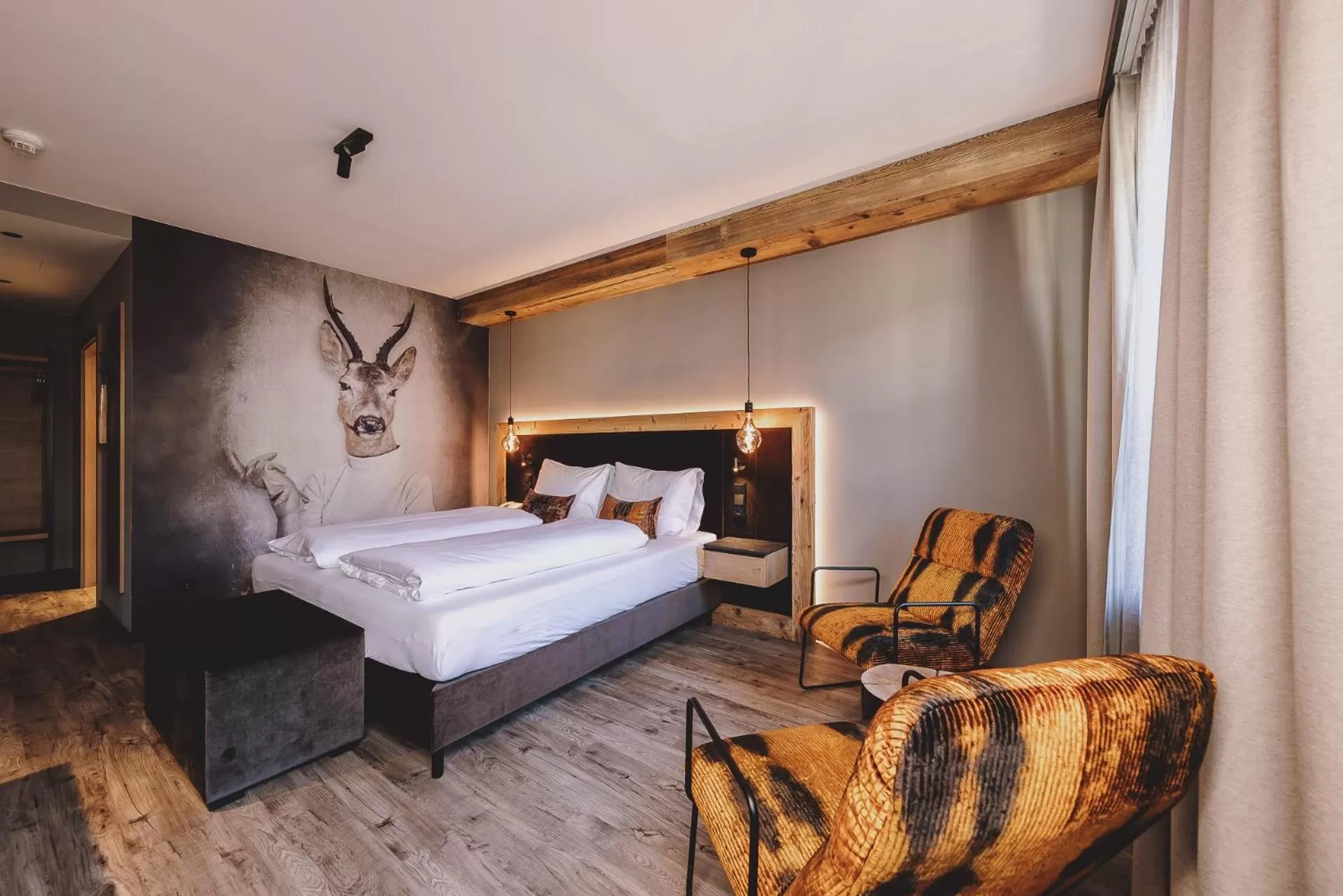 Photo of the whole room, Bed in POST POST Hotel - Alpine Boutique Hotel & Spa