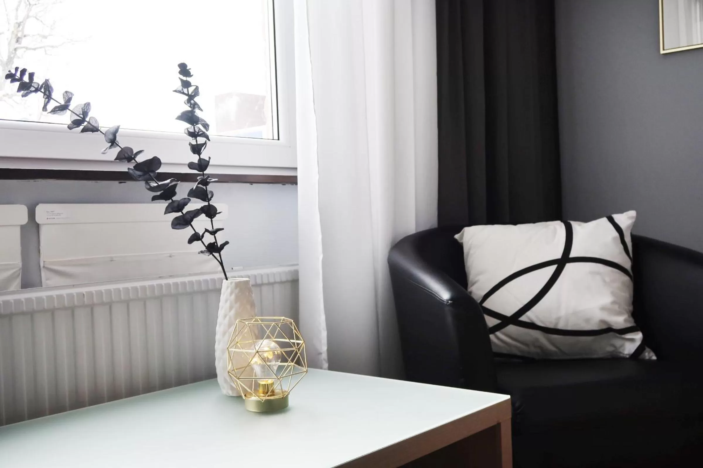 Seating area in Optima Hotel Roslagen by Reikartz