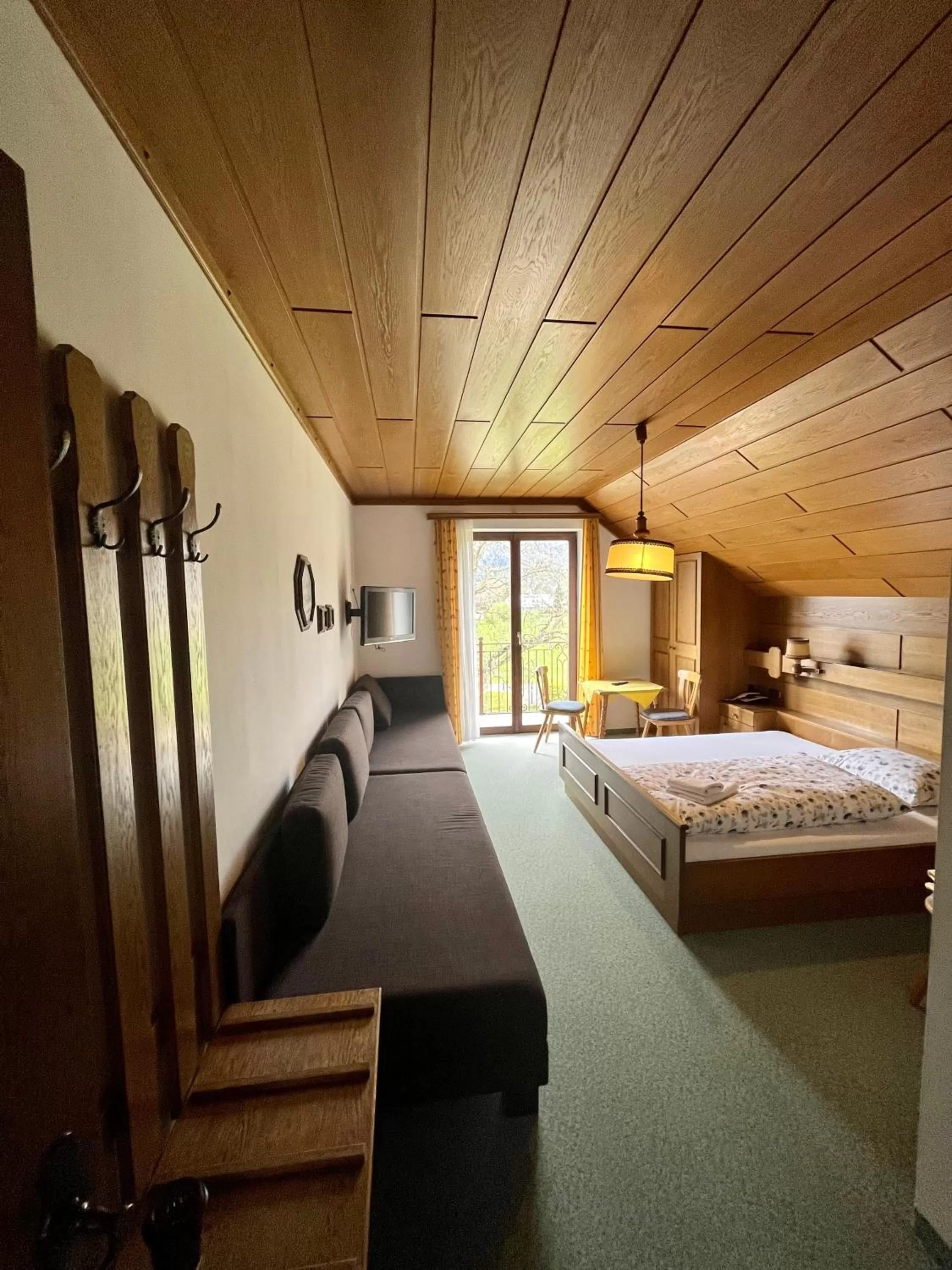 Bed in Pension Sommerauer