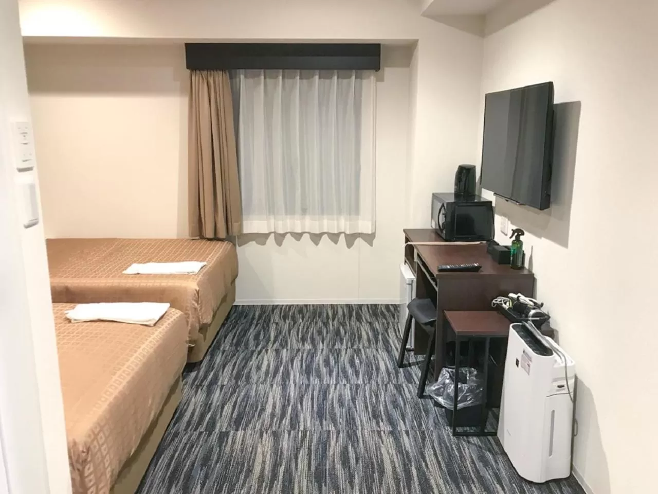 Photo of the whole room, Bed in HOTEL LiVEMAX Takamatsu Eki Mae