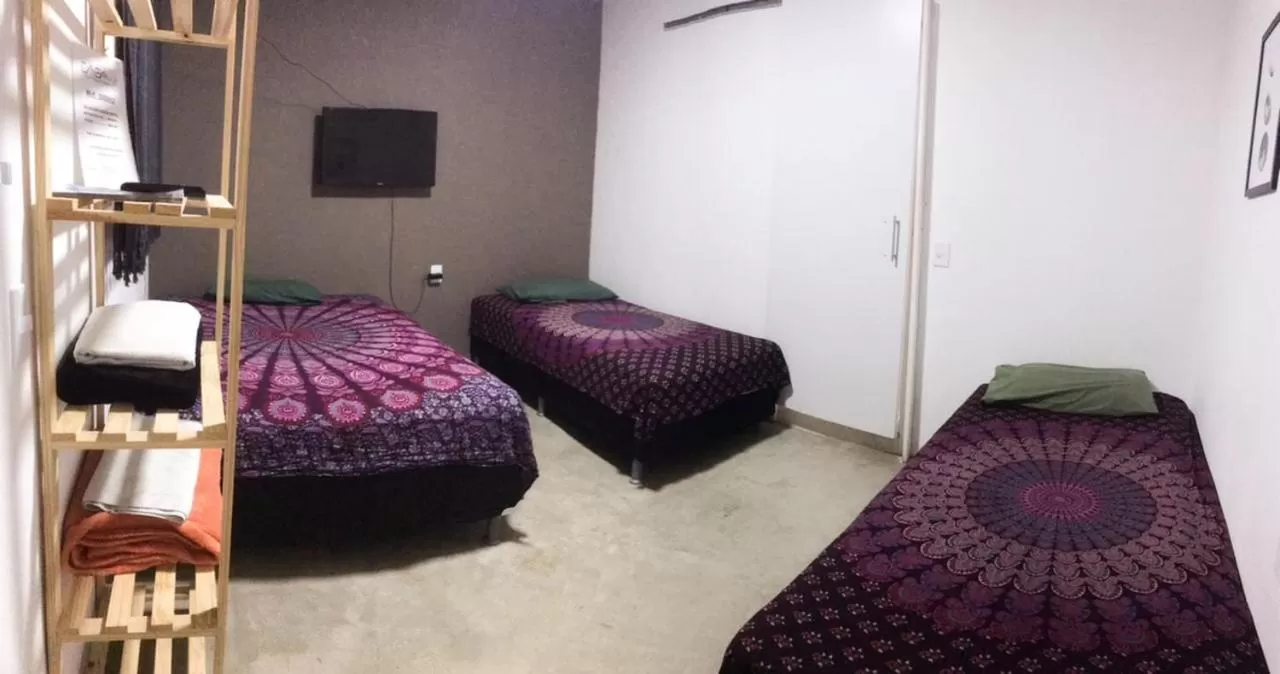 Bed in Pousada Casa de Vó