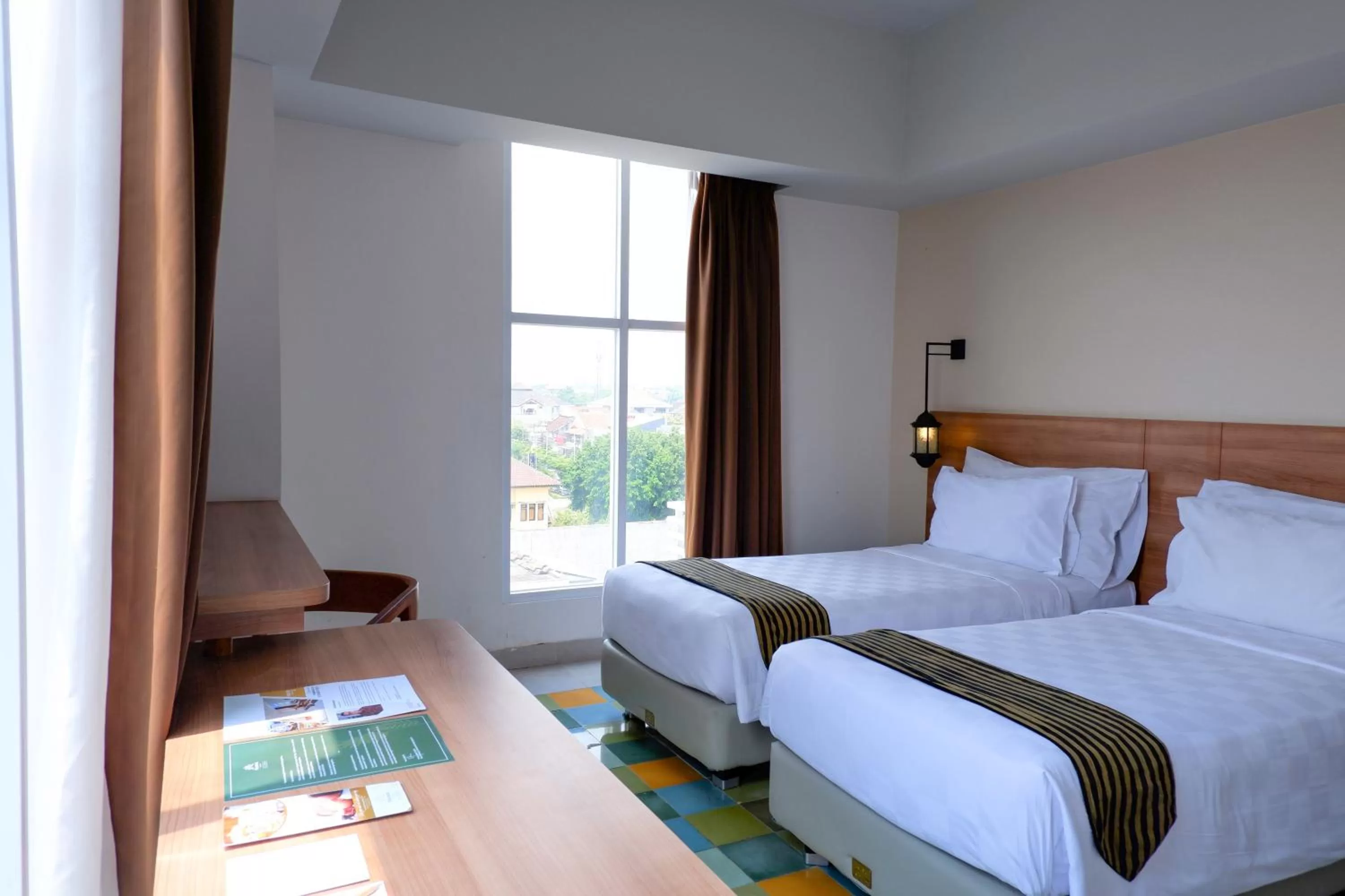 Bed in KHAS Tugu Hotel Yogyakarta