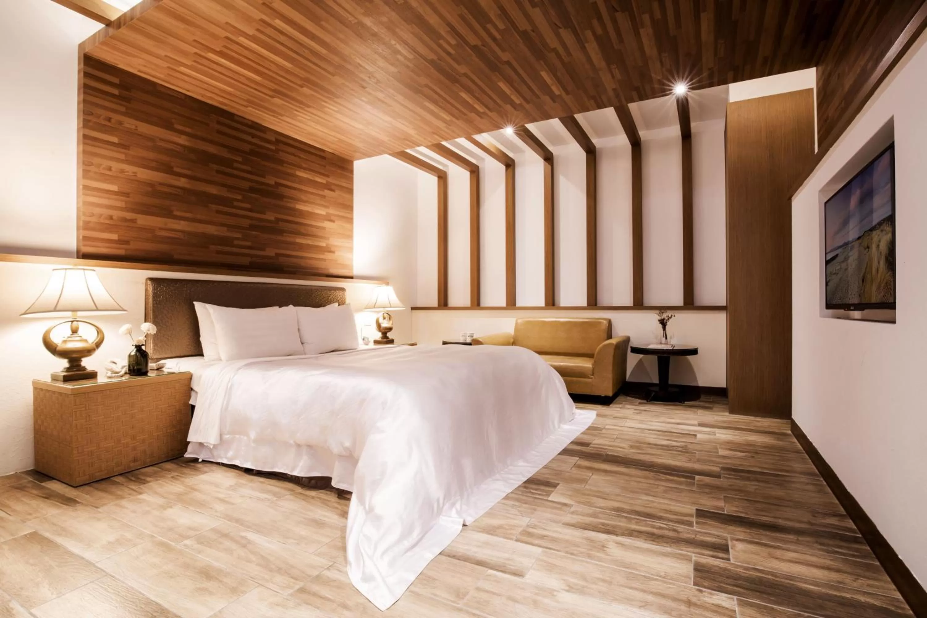 Bed in Duo Romance Hotel