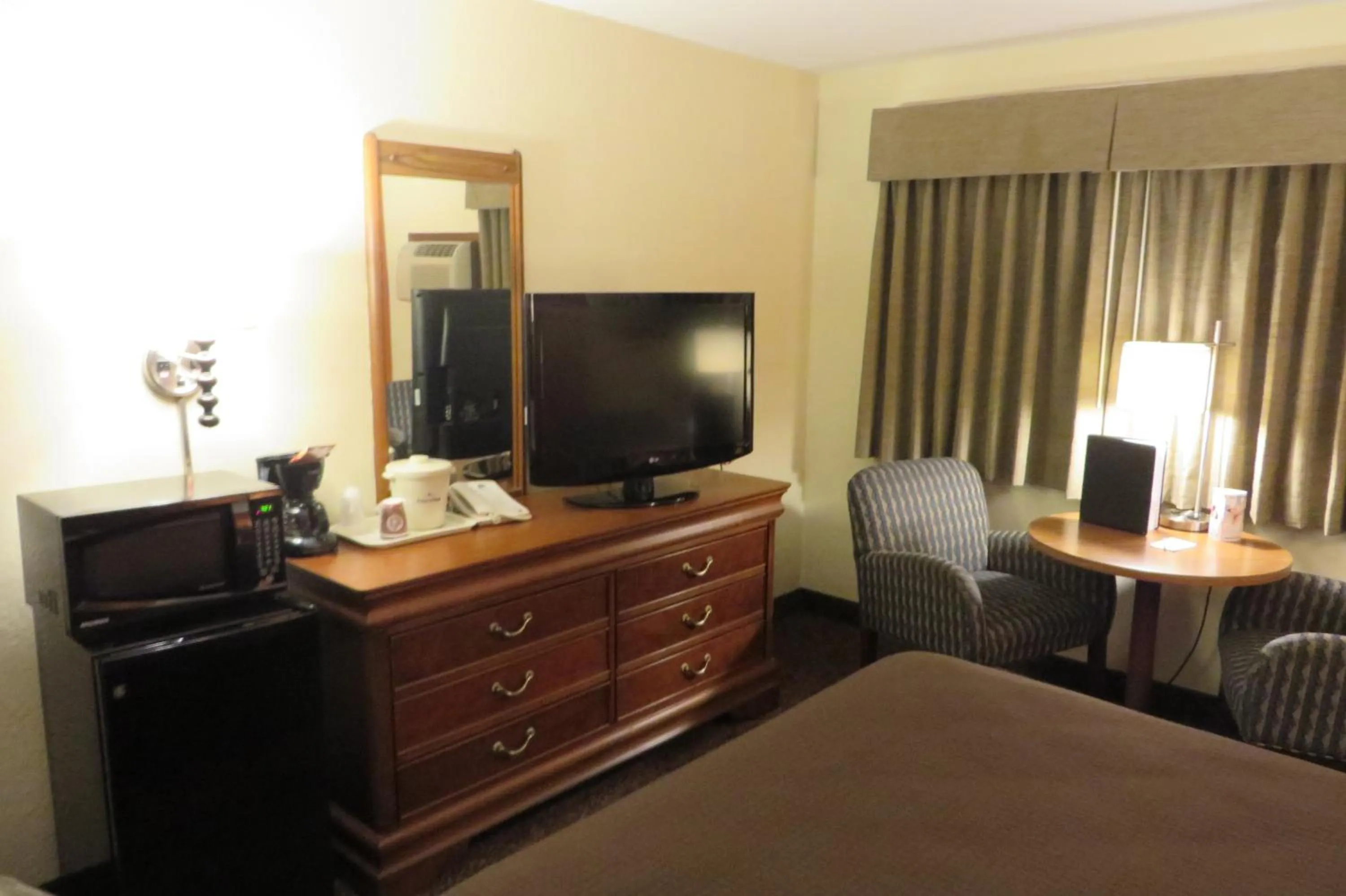 TV and multimedia, Bed in AmericInn by Wyndham Forest Lake