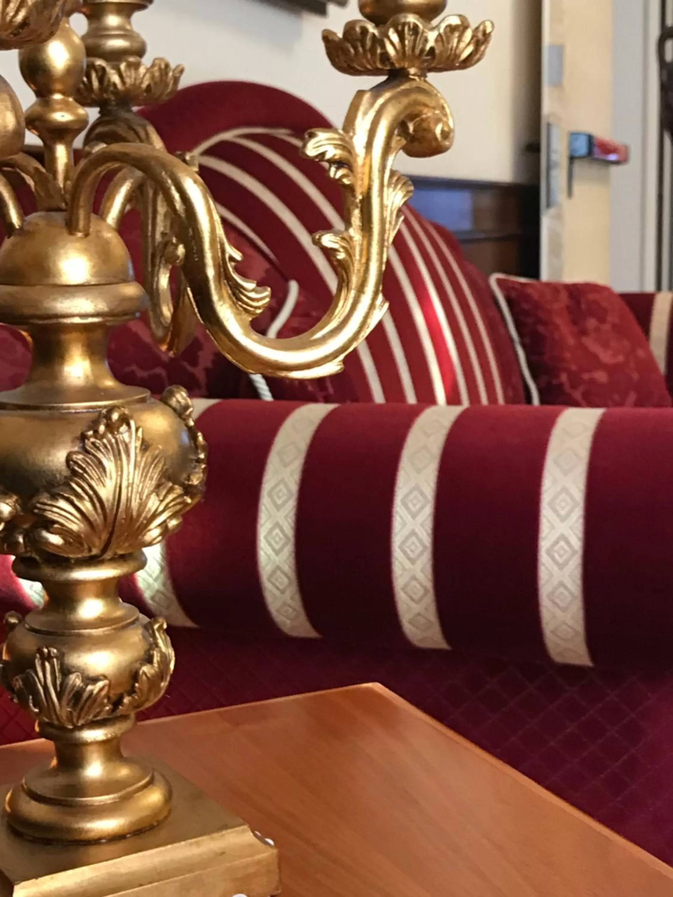 Communal lounge/ TV room, Bed in Grand Hotel Palace