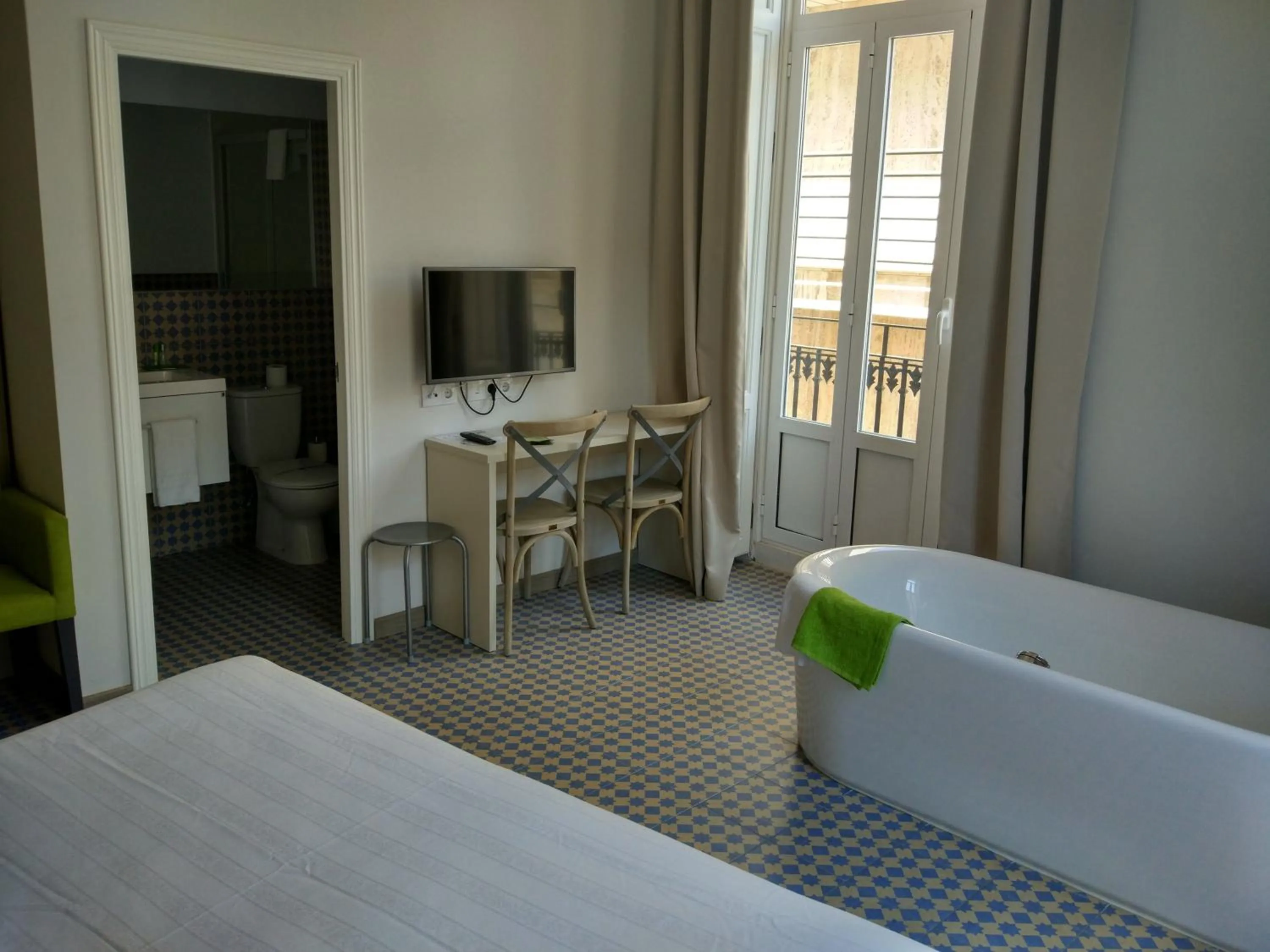 Bed in Hotel San Lorenzo Boutique Plaza