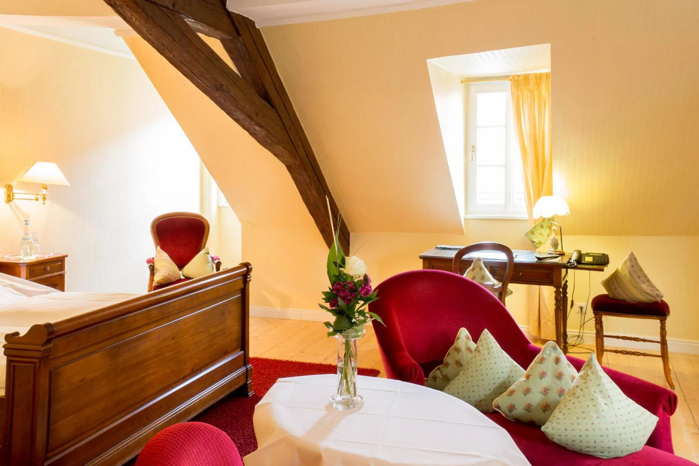 Photo of the whole room, Bed in WAGNERS Hotel Greifen-Post