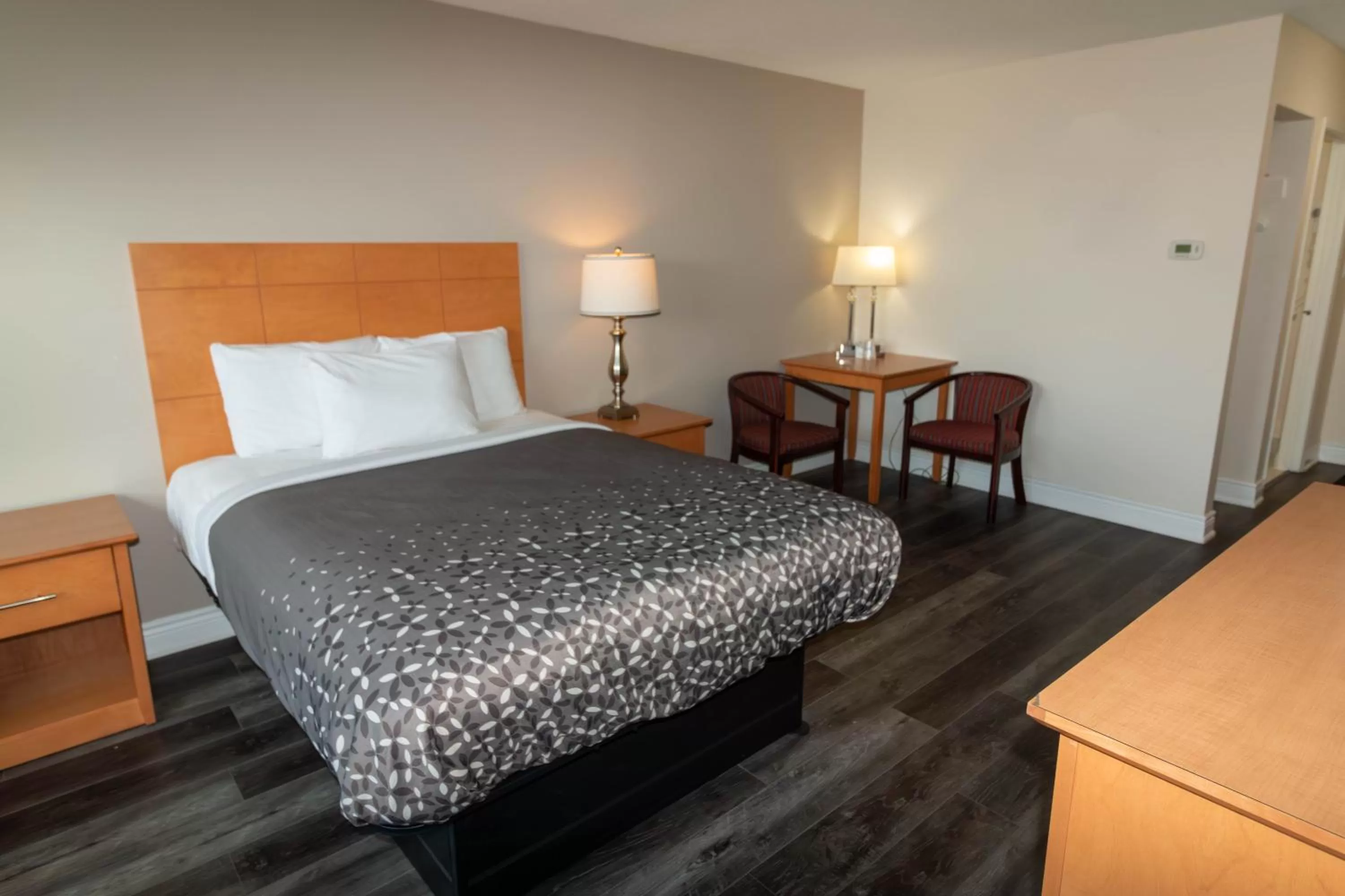 Bed in Borden Inn and Suites