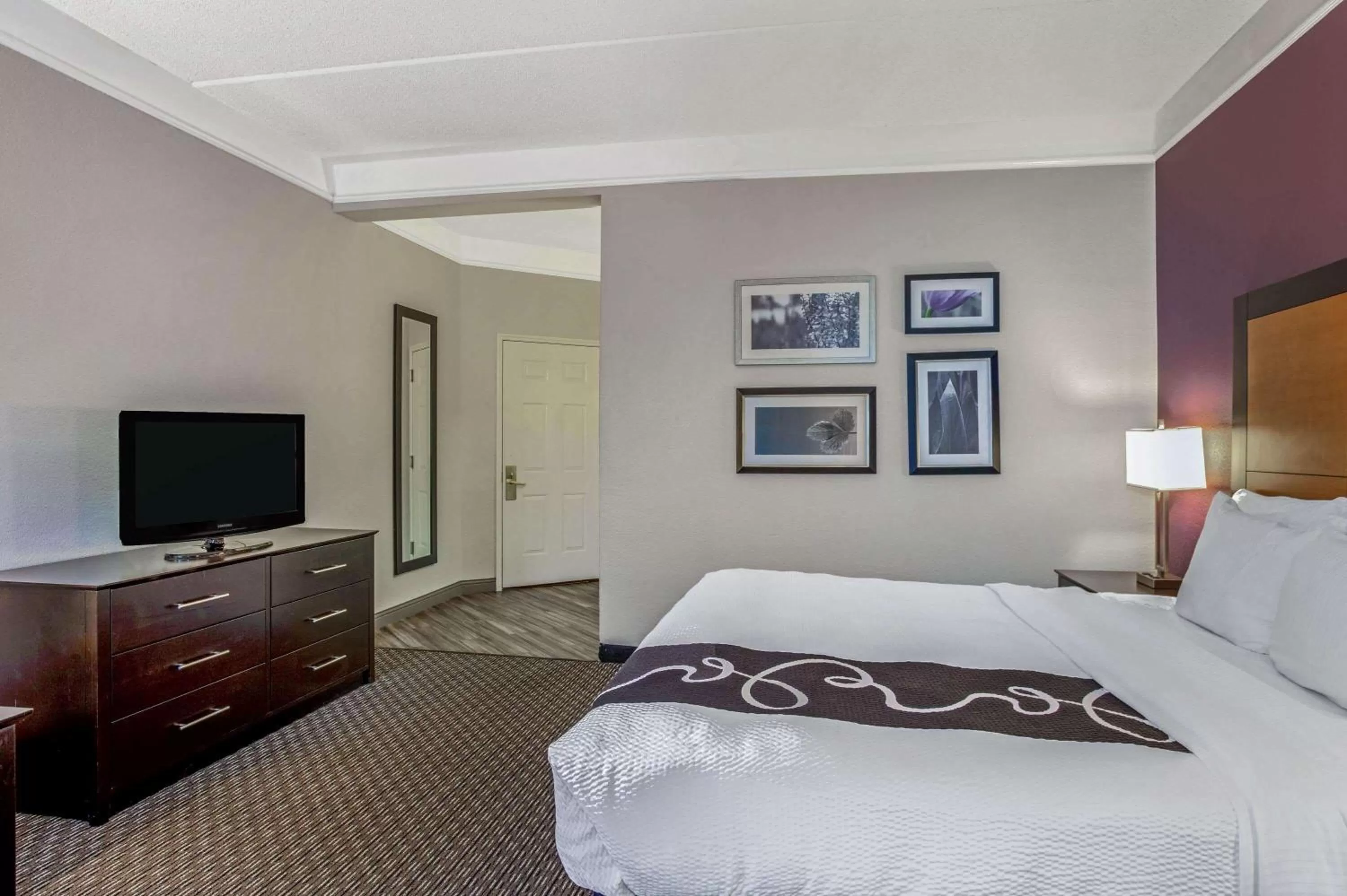 Photo of the whole room, Bed in La Quinta by Wyndham Orlando Airport North - Free Airport Shuttle!