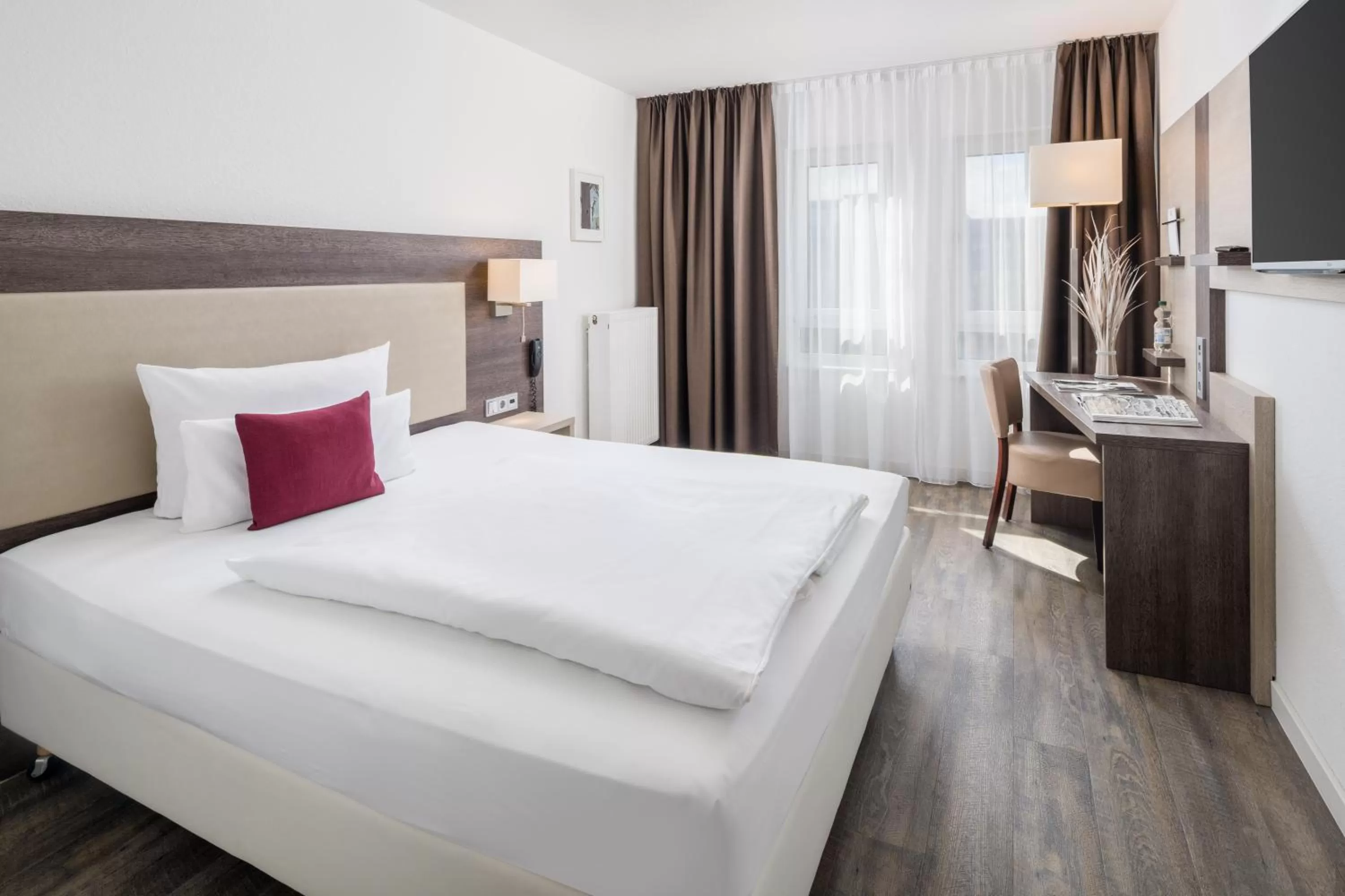 Photo of the whole room, Bed in Hotel Newton Karlsruhe