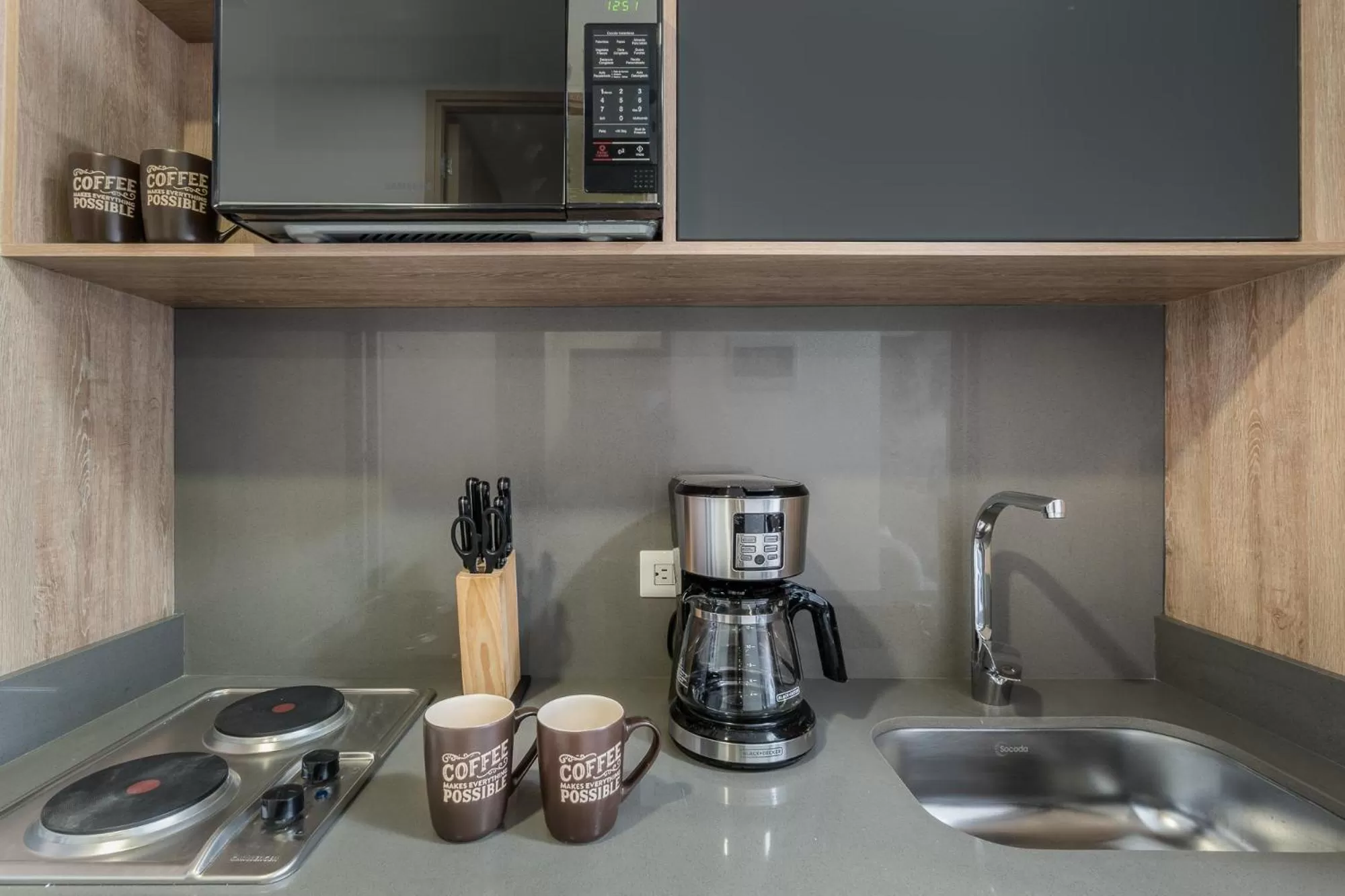 Kitchen or kitchenette in Apartamentos Go Living & Suites by HOUSY HOST