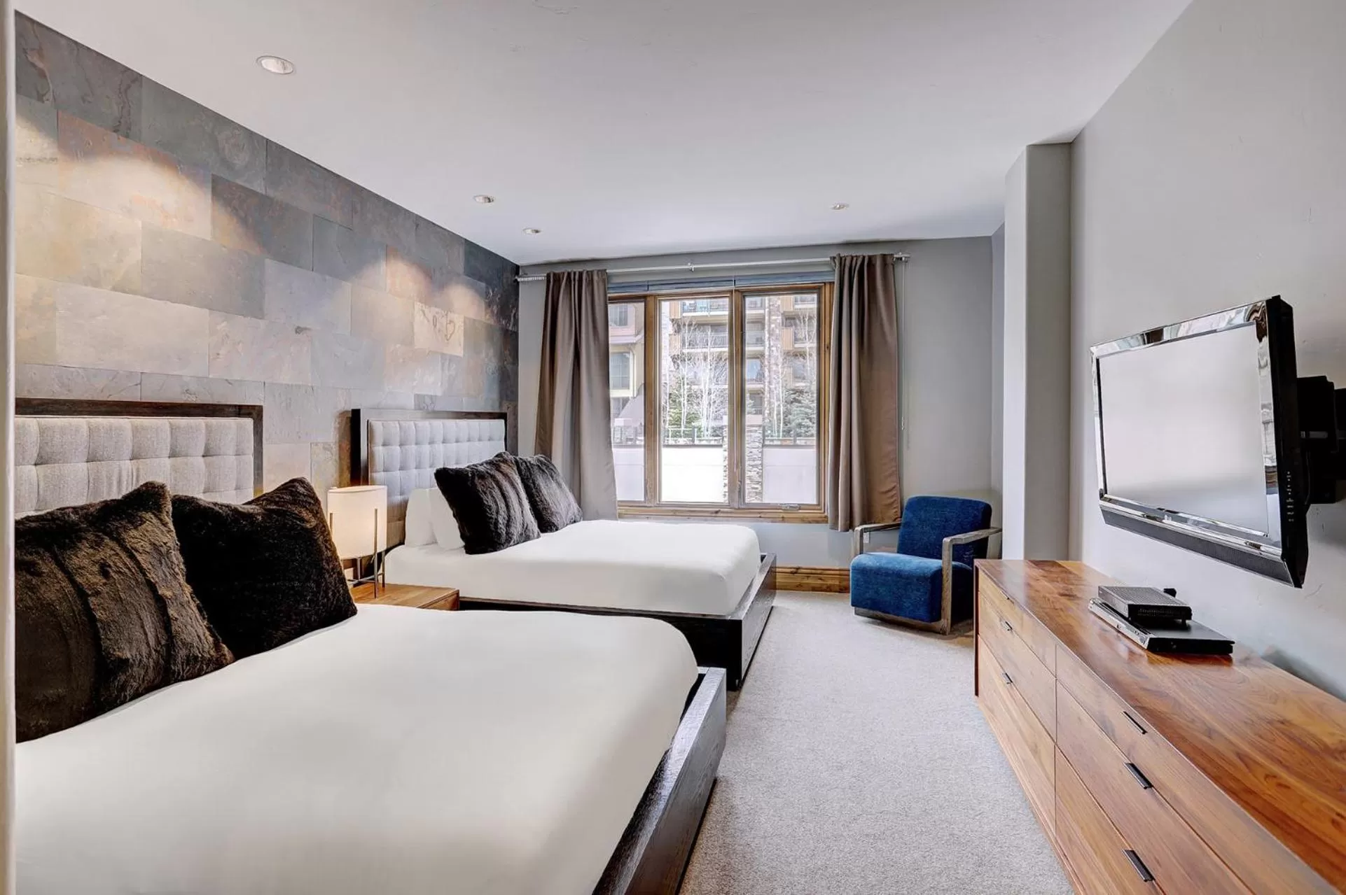 Bed in The Arrabelle at Vail Square, a RockResort