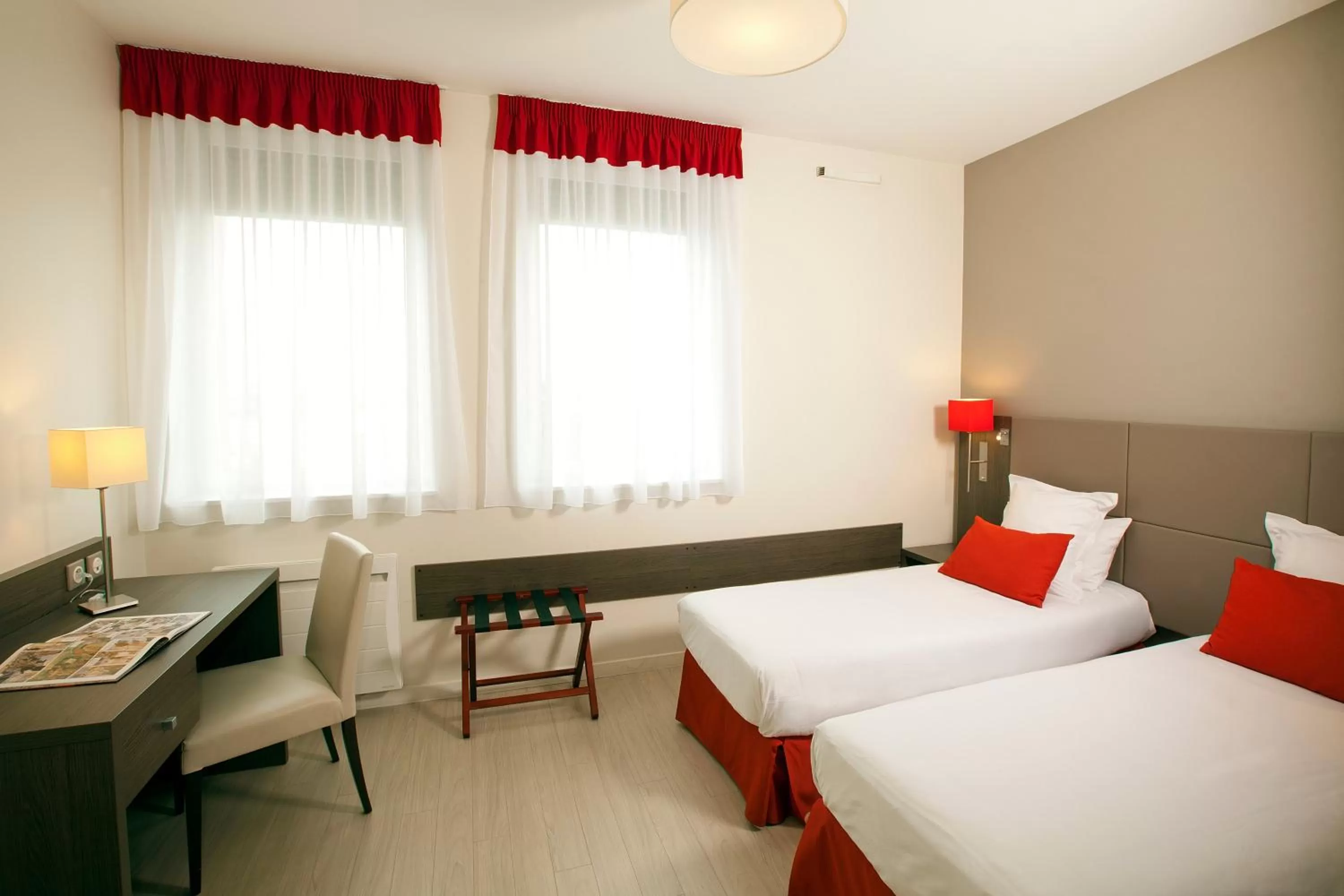 Seating area, Bed in Residhome Reims Centre