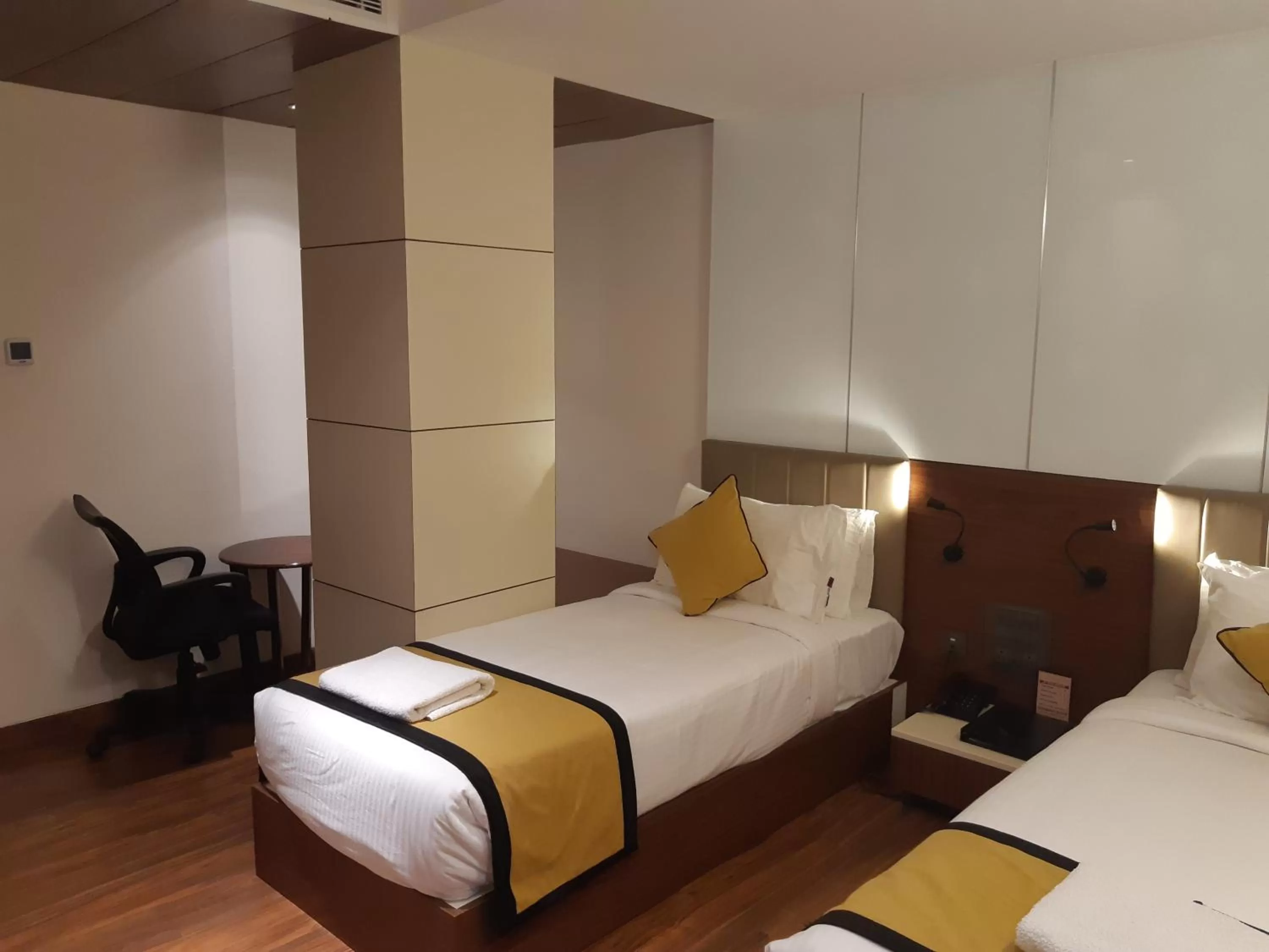 Bed in Hotel Namo Residency