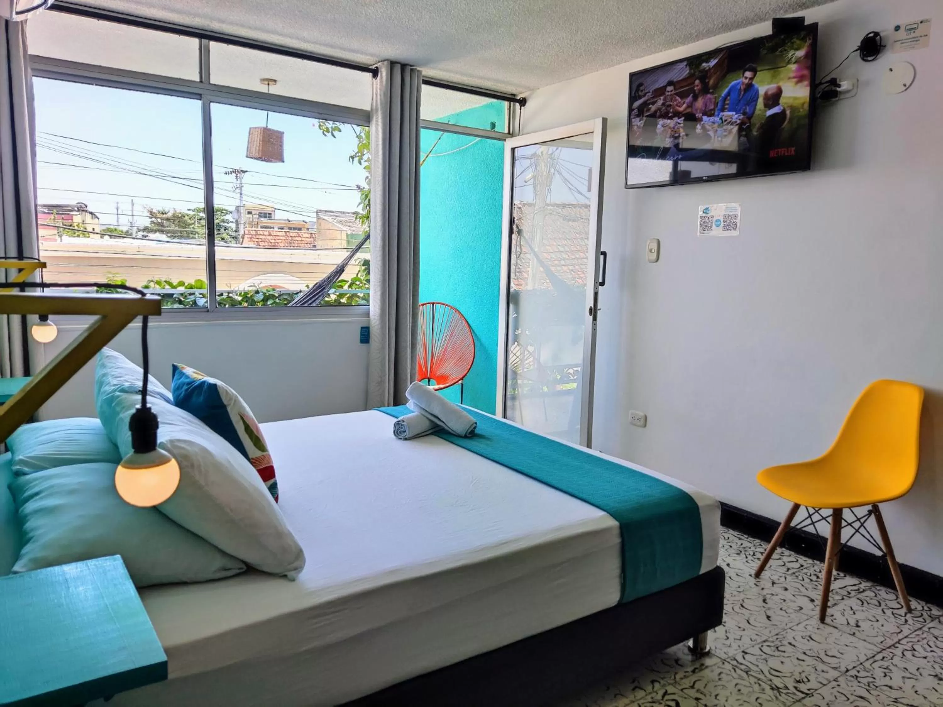 Bed in Bona Vida Hotel