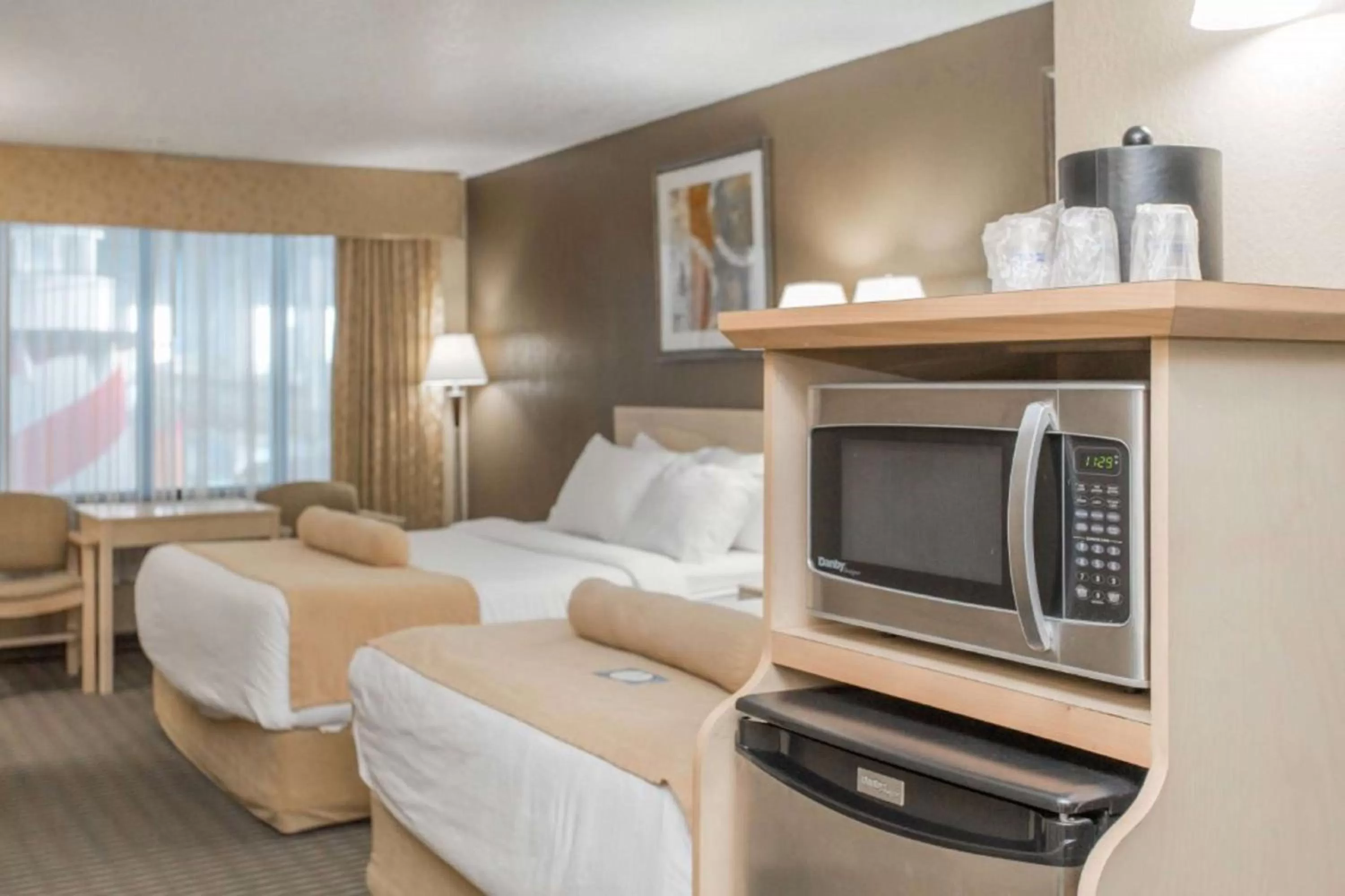 Photo of the whole room, Bed in Seven Oaks Hotel Regina