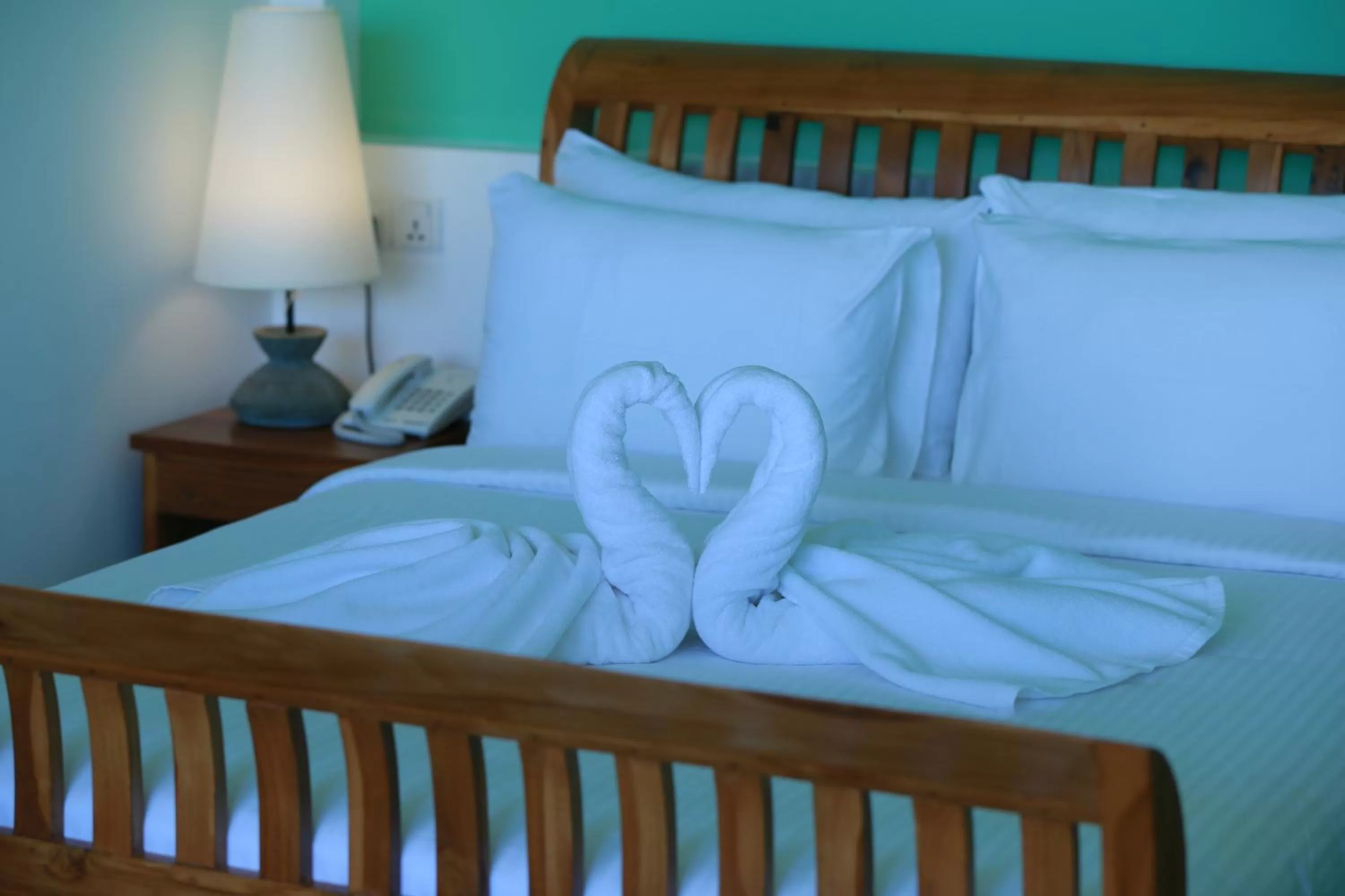 Bed in Ella Planters Bungalow