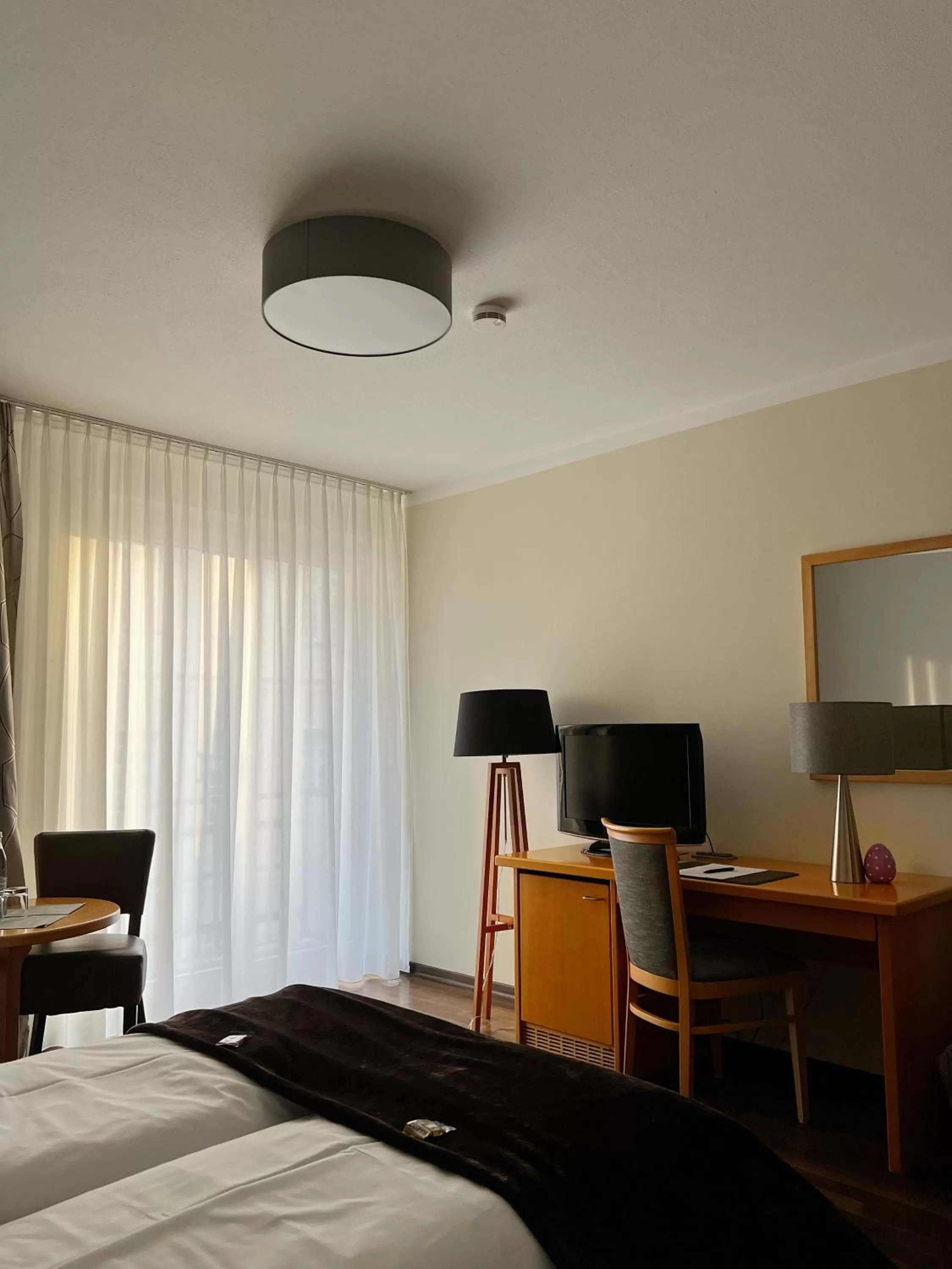 Seating area, Bed in Hotel Prinz