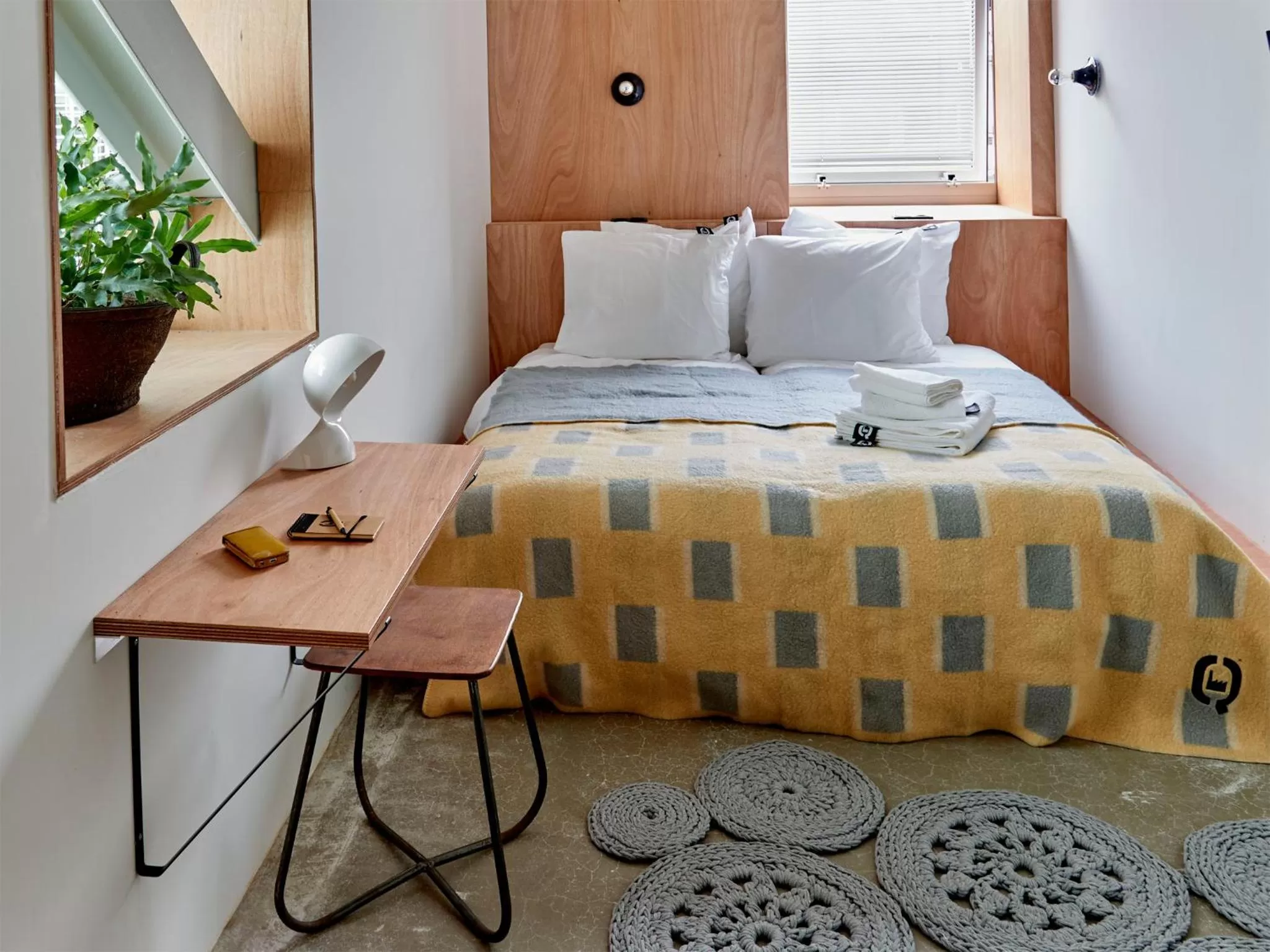 Bed in Q-Factory Hotel