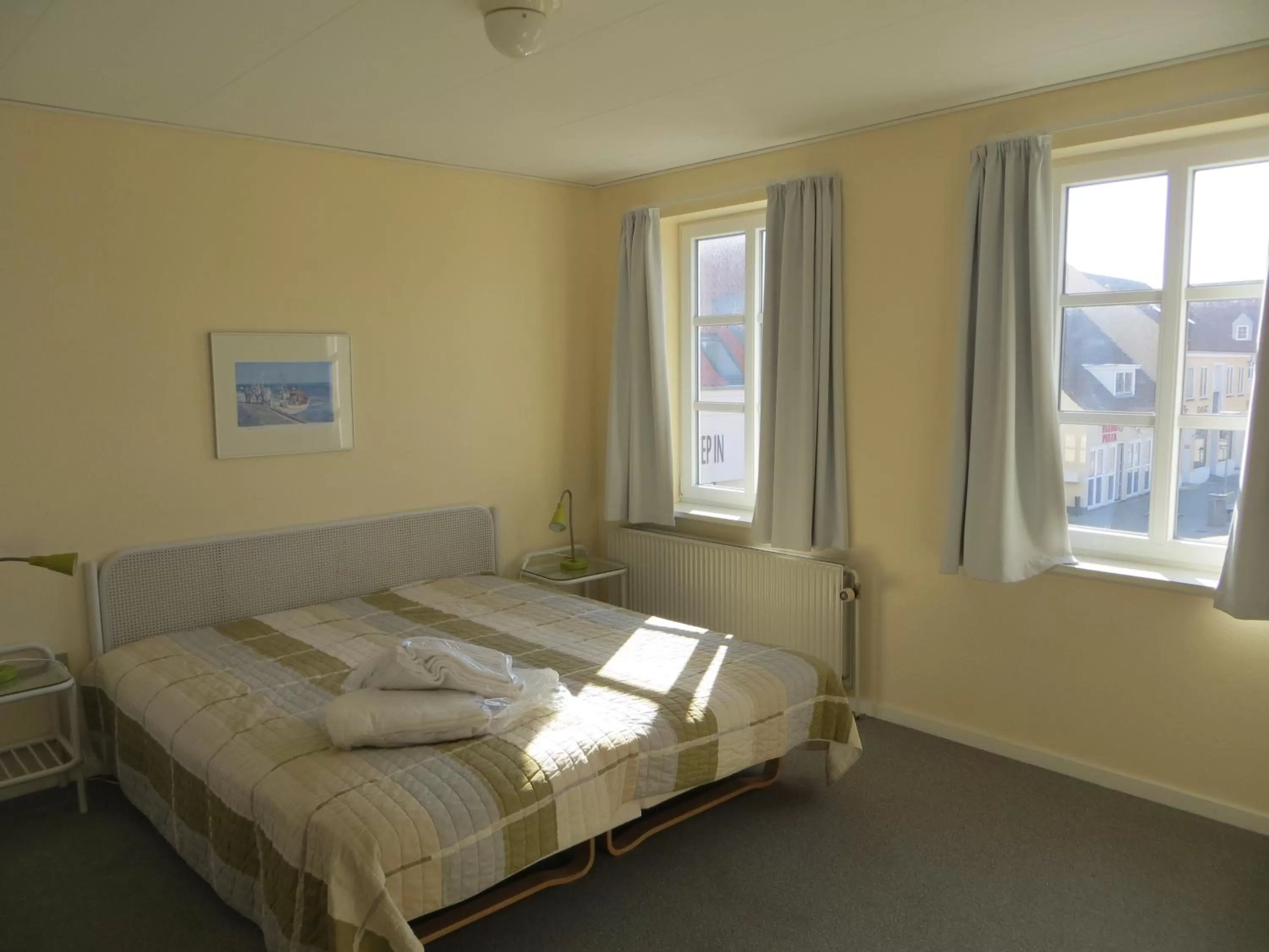 Bed in Løkken Badehotel Apartments