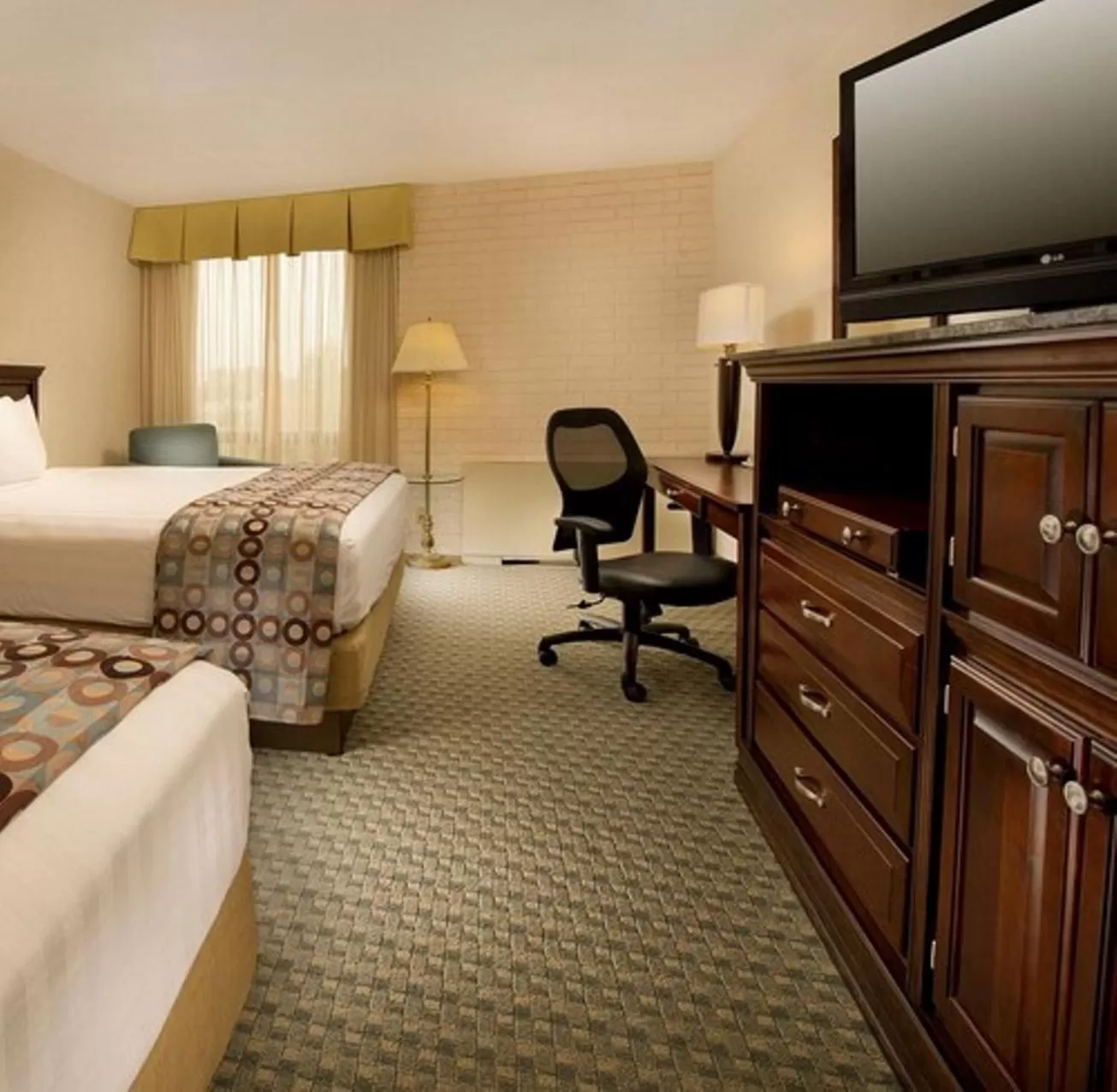 Bed in Hotel Lotus Kansas City Stadium