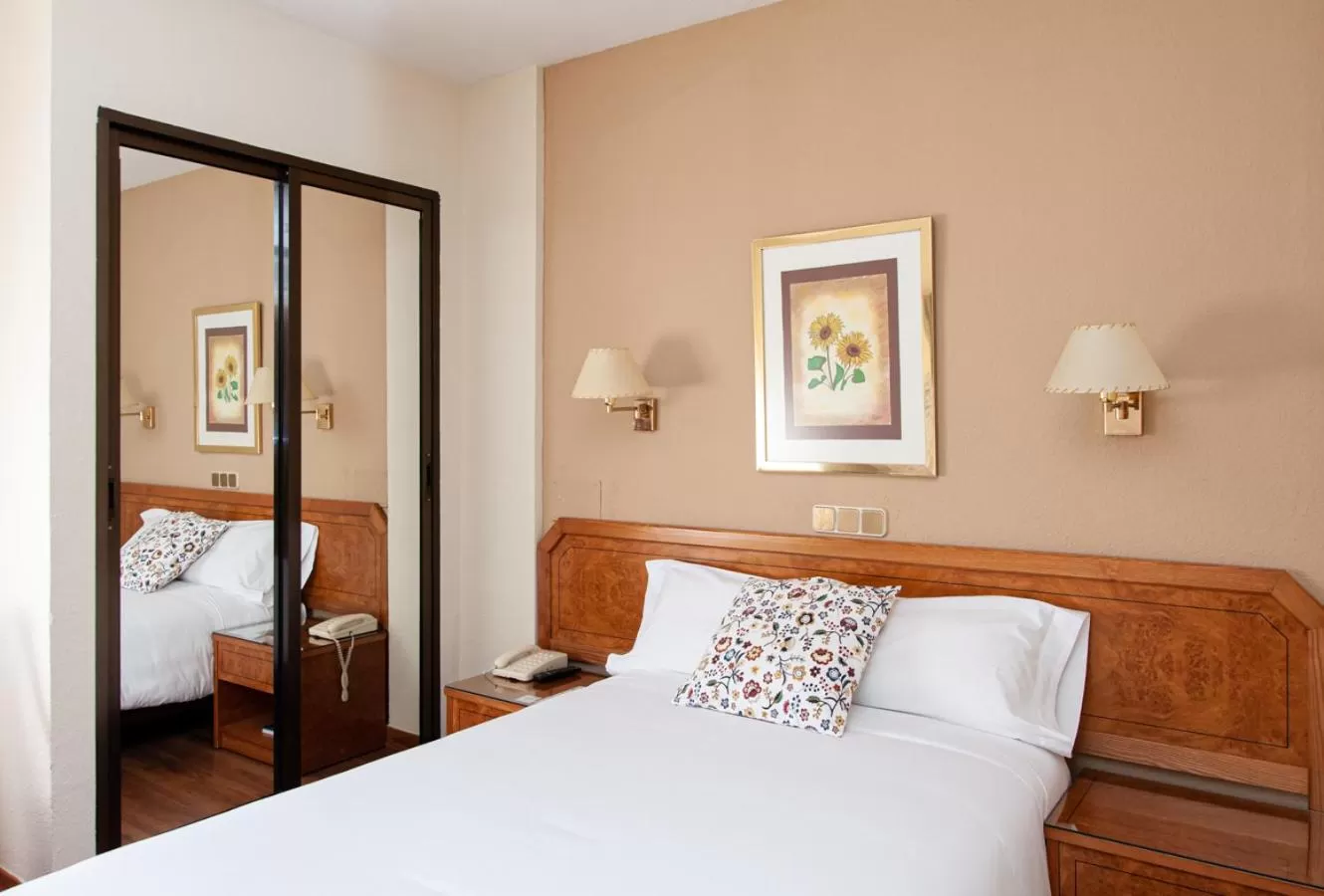 Bed in Hotel Don Carmelo