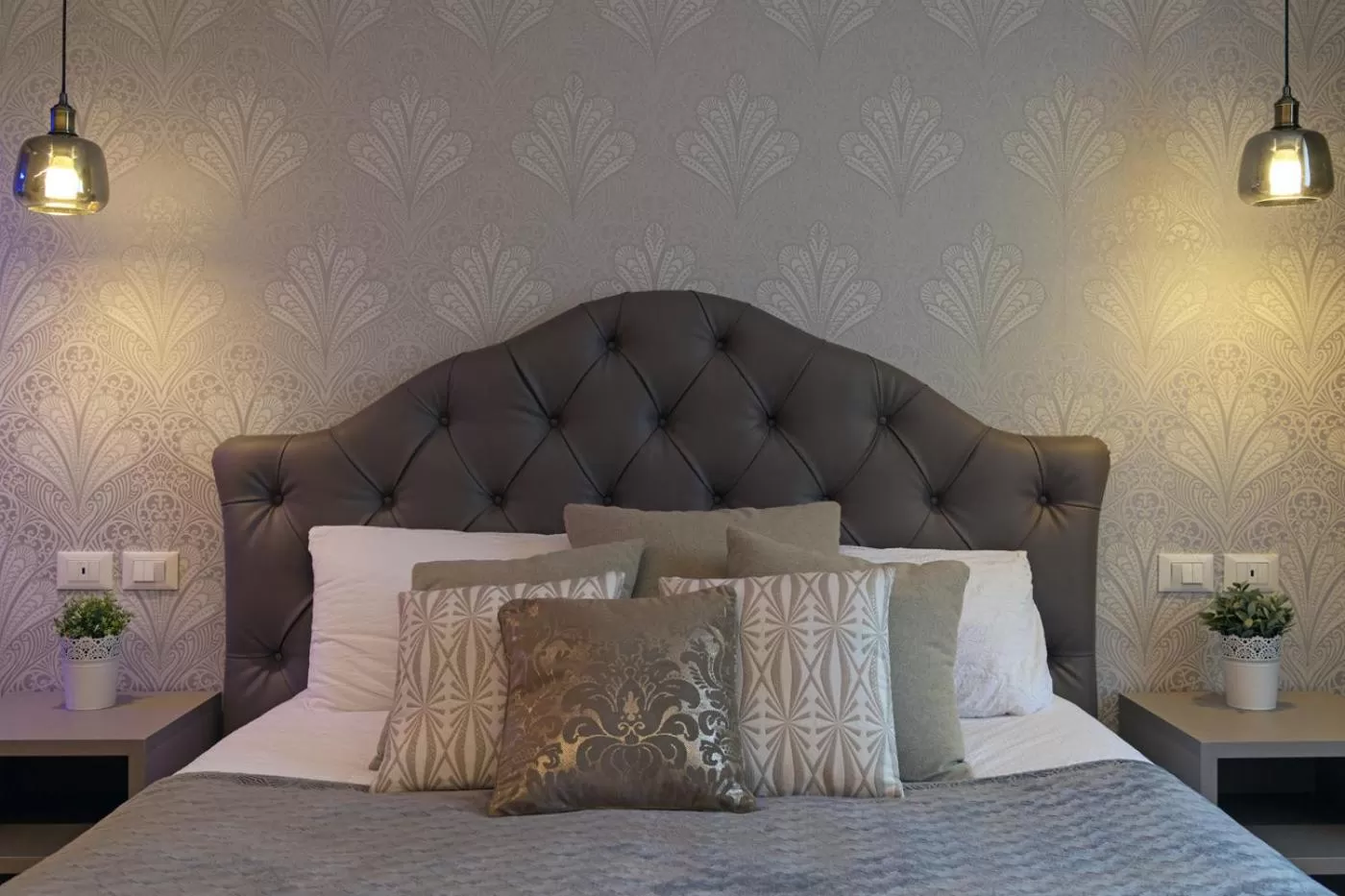 Bed in Lainez Rooms & Suites