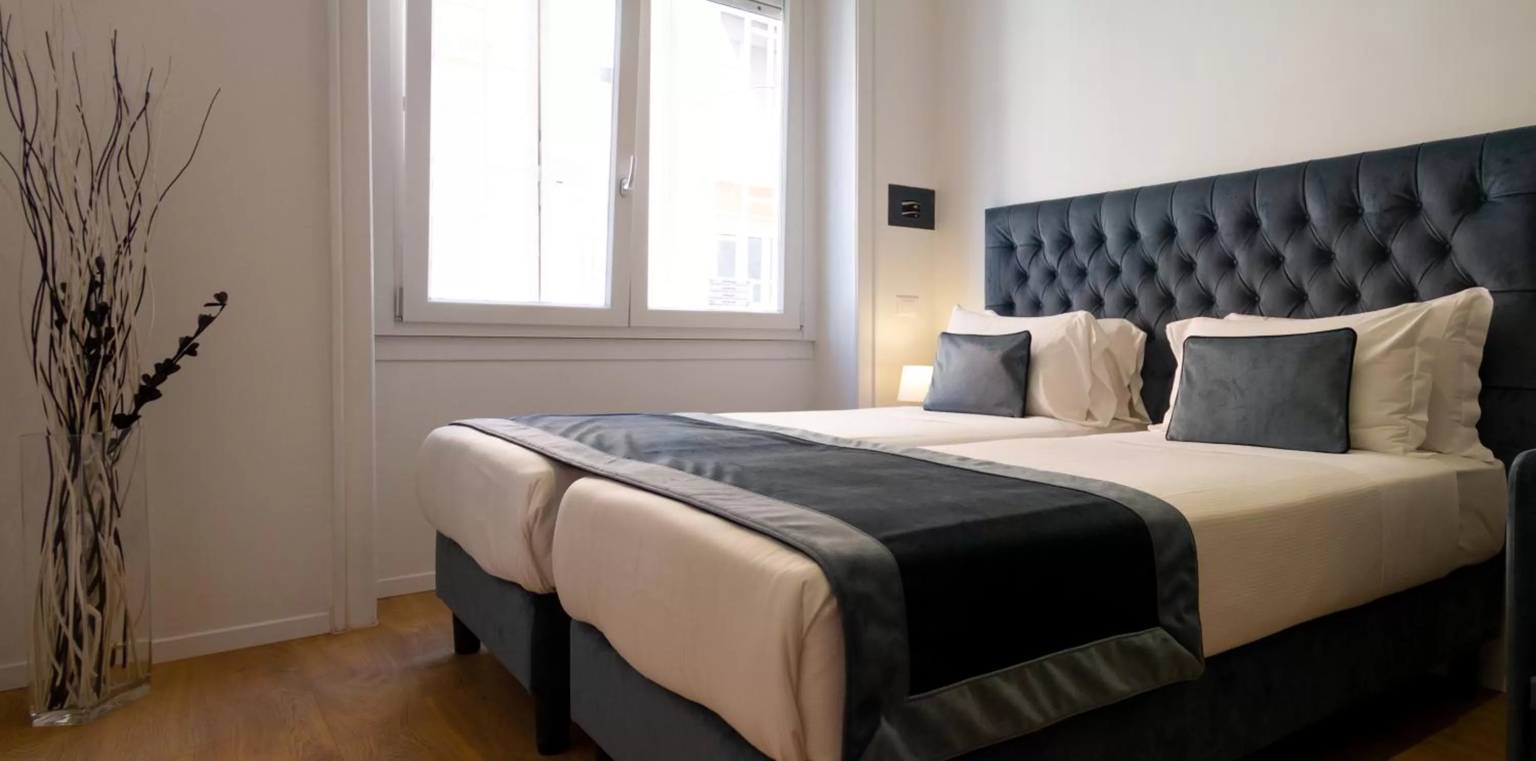 Bed in Michelangelo Vatican Rooms