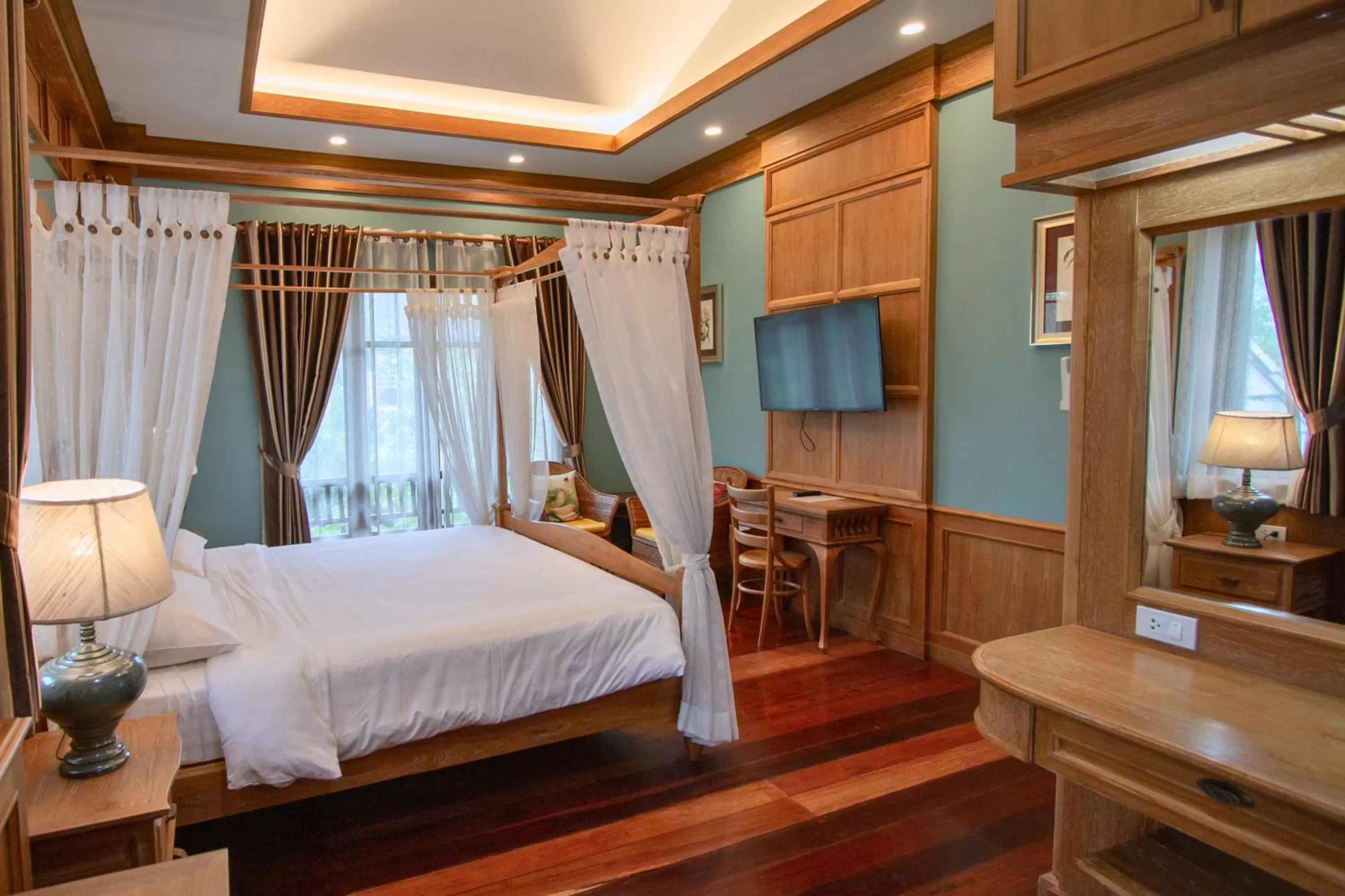 Bed in Rich Garden House Hotel