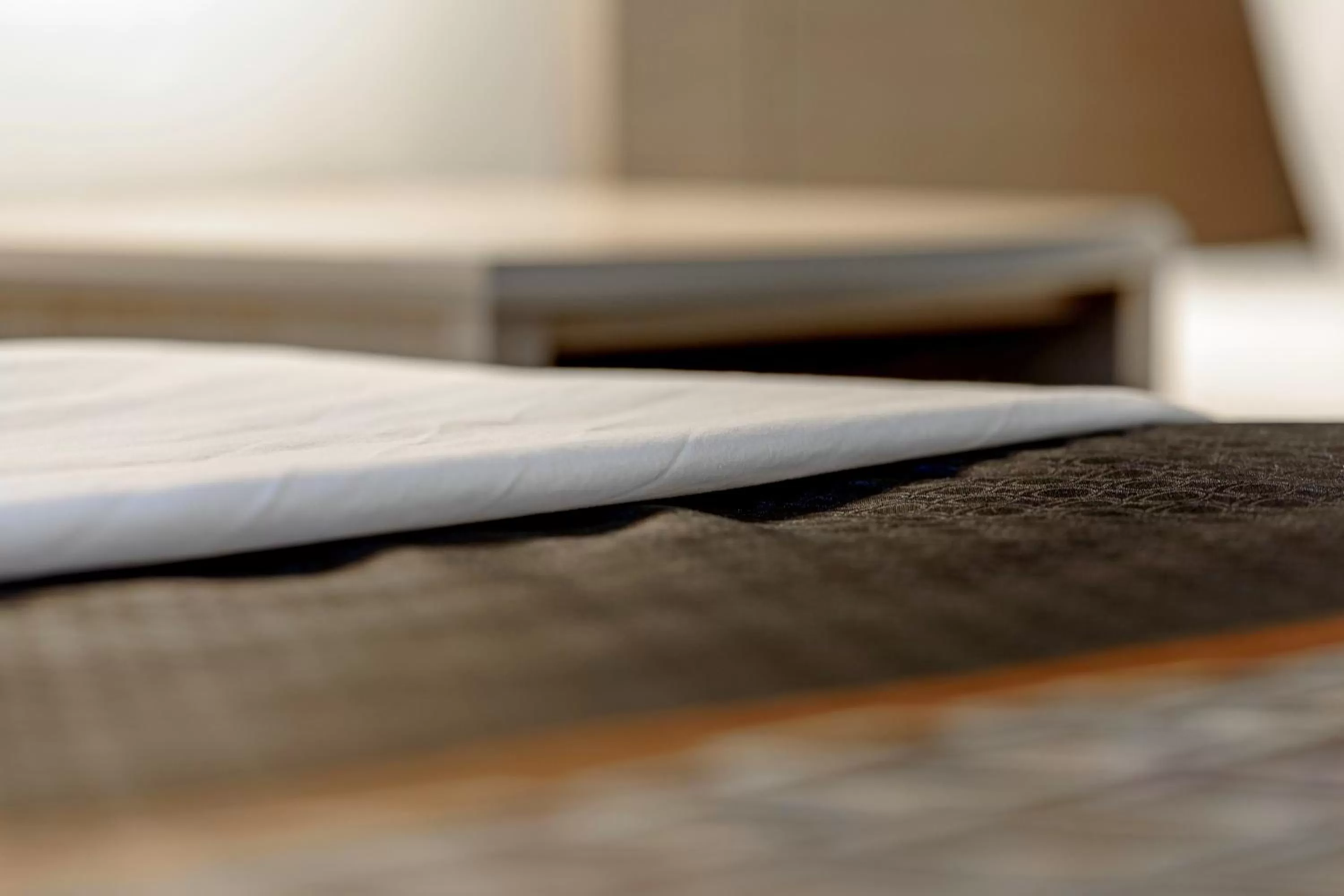 Bed in The Gunnison Inn at Dos Rios Golf Course