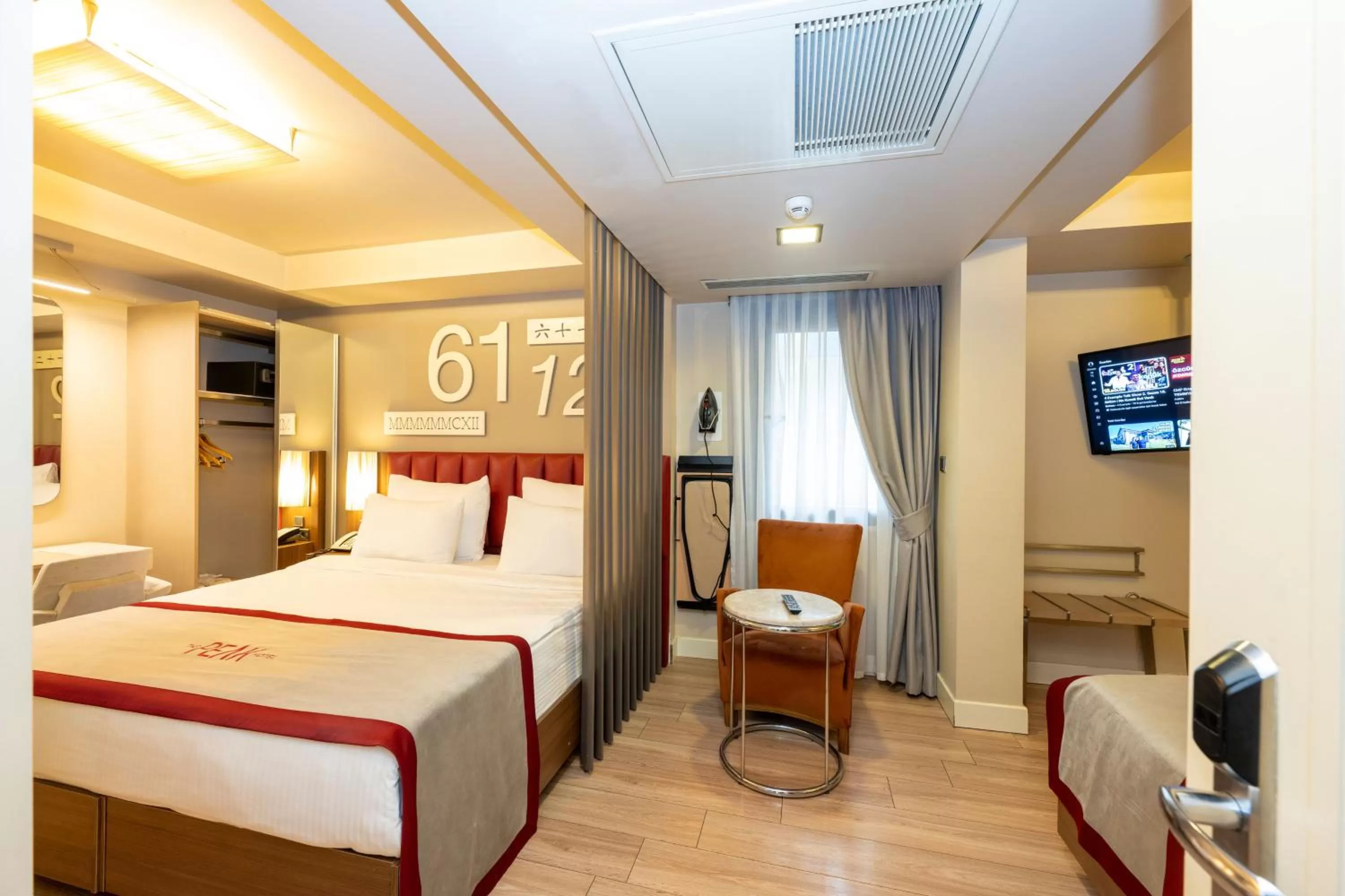 Communal lounge/ TV room, Bed in Ramada By Wyndham Istanbul Pera Taksim