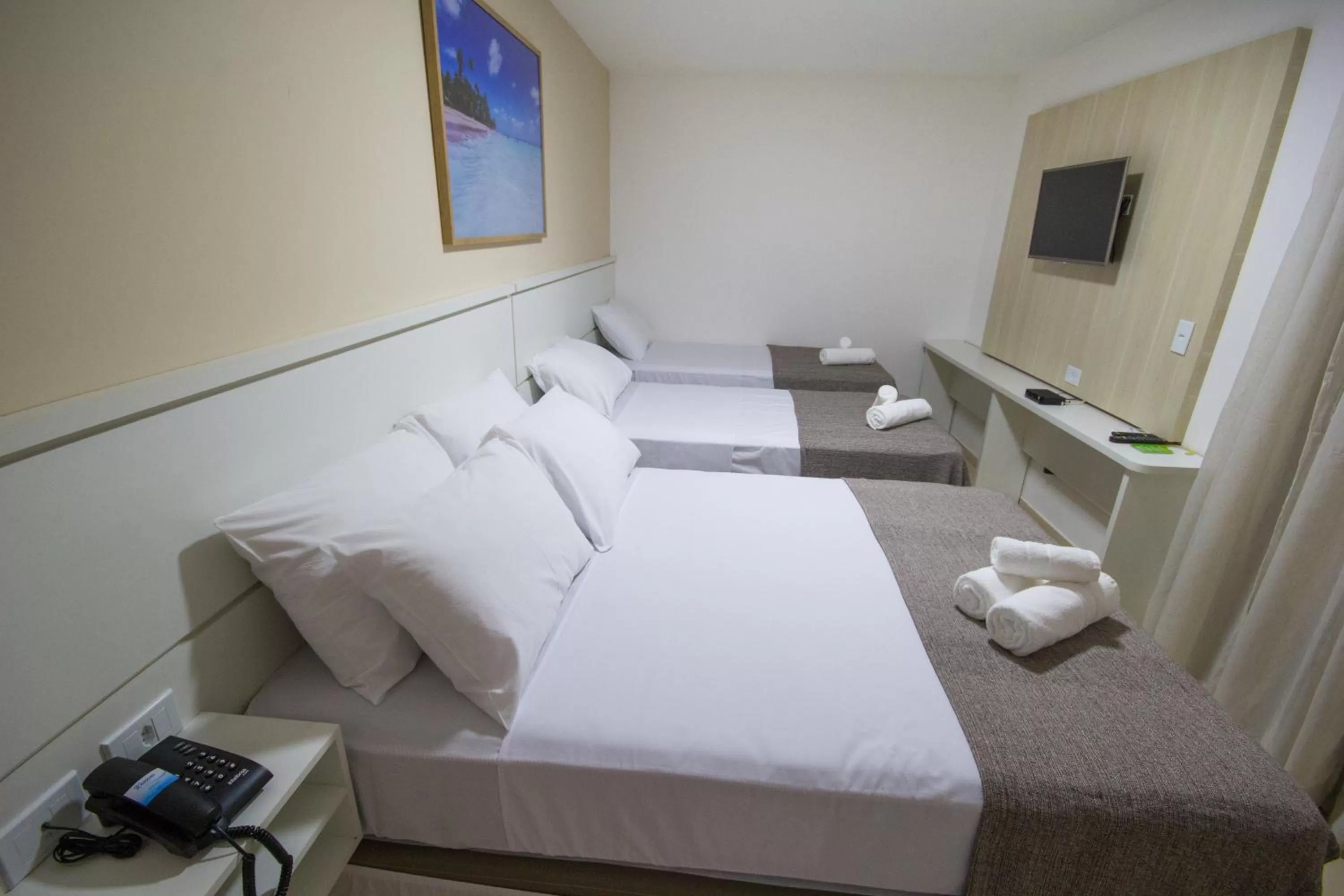 Bed in Pousada Kanoas