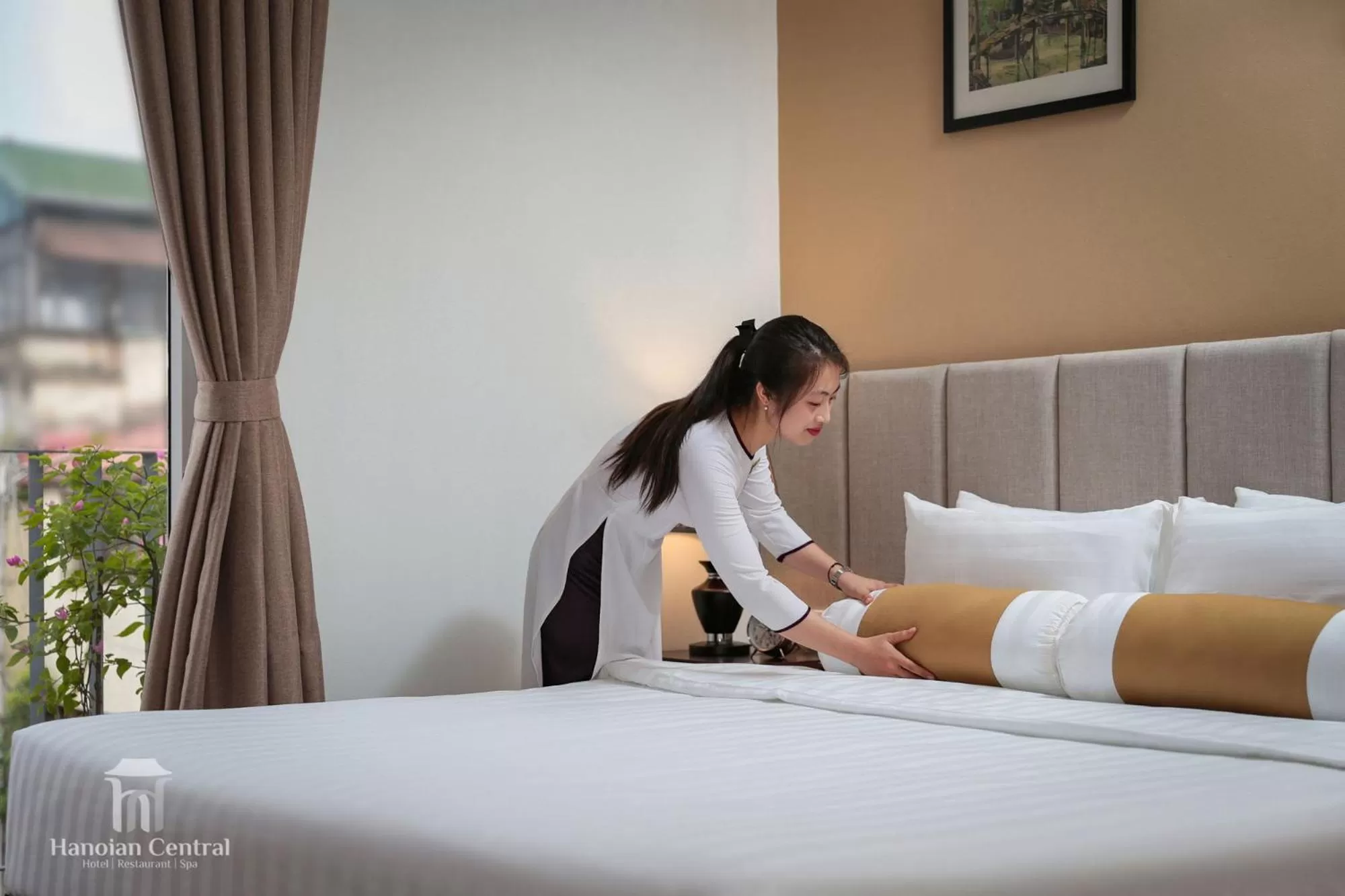 Staff, Bed in Hanoian Central Hotel & Spa