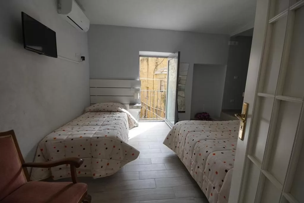 Bedroom, Bed in Locazione Turistica Domus Re