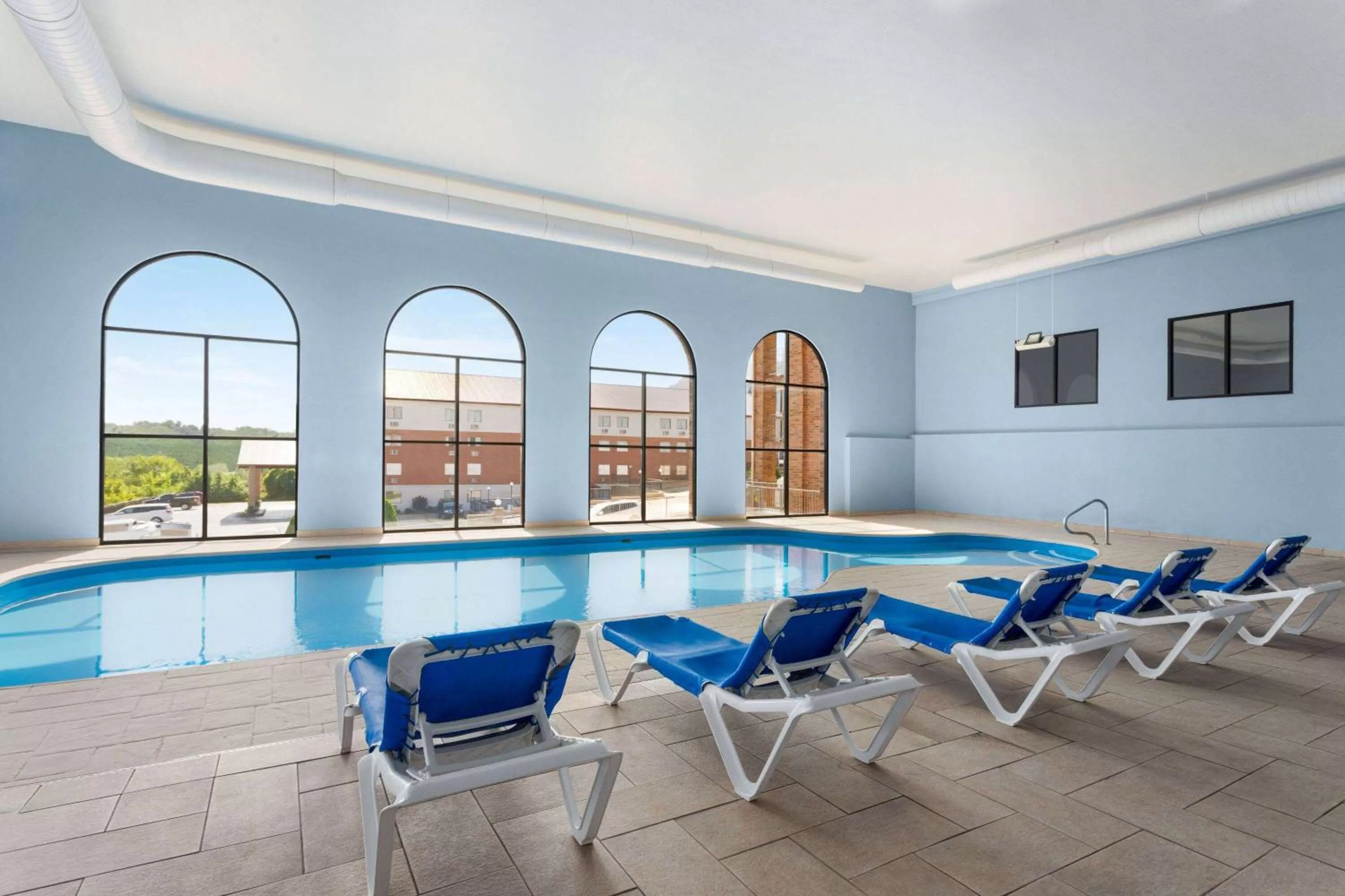 Swimming pool in AmericInn by Wyndham Branson & Conference Center